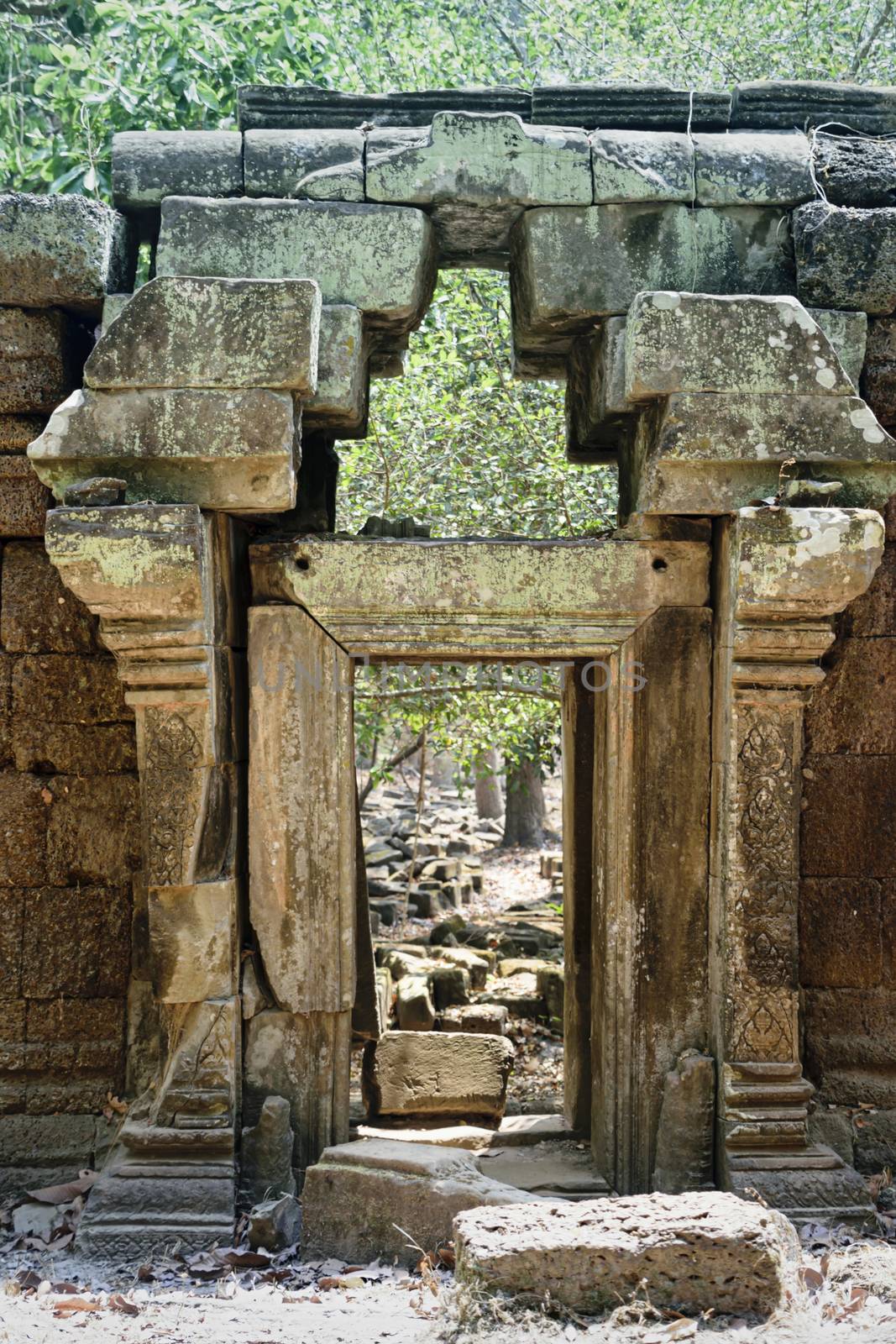 Angkor Thom, Cambodia, March 2016: Minor structures in the  gardens round the  Baphuon temple mountain. reconstructed by archaeologists over 16 years following the khmer rouge conflict