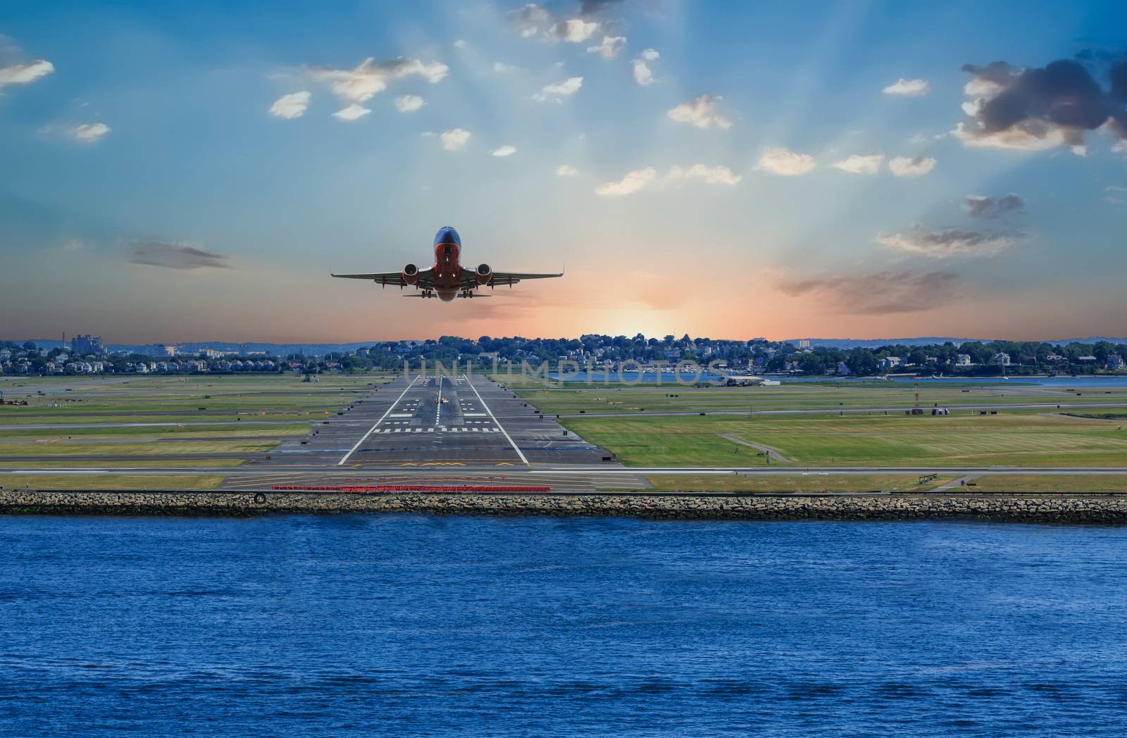 Plane Taking Off in Boston Sunrise by dbvirago