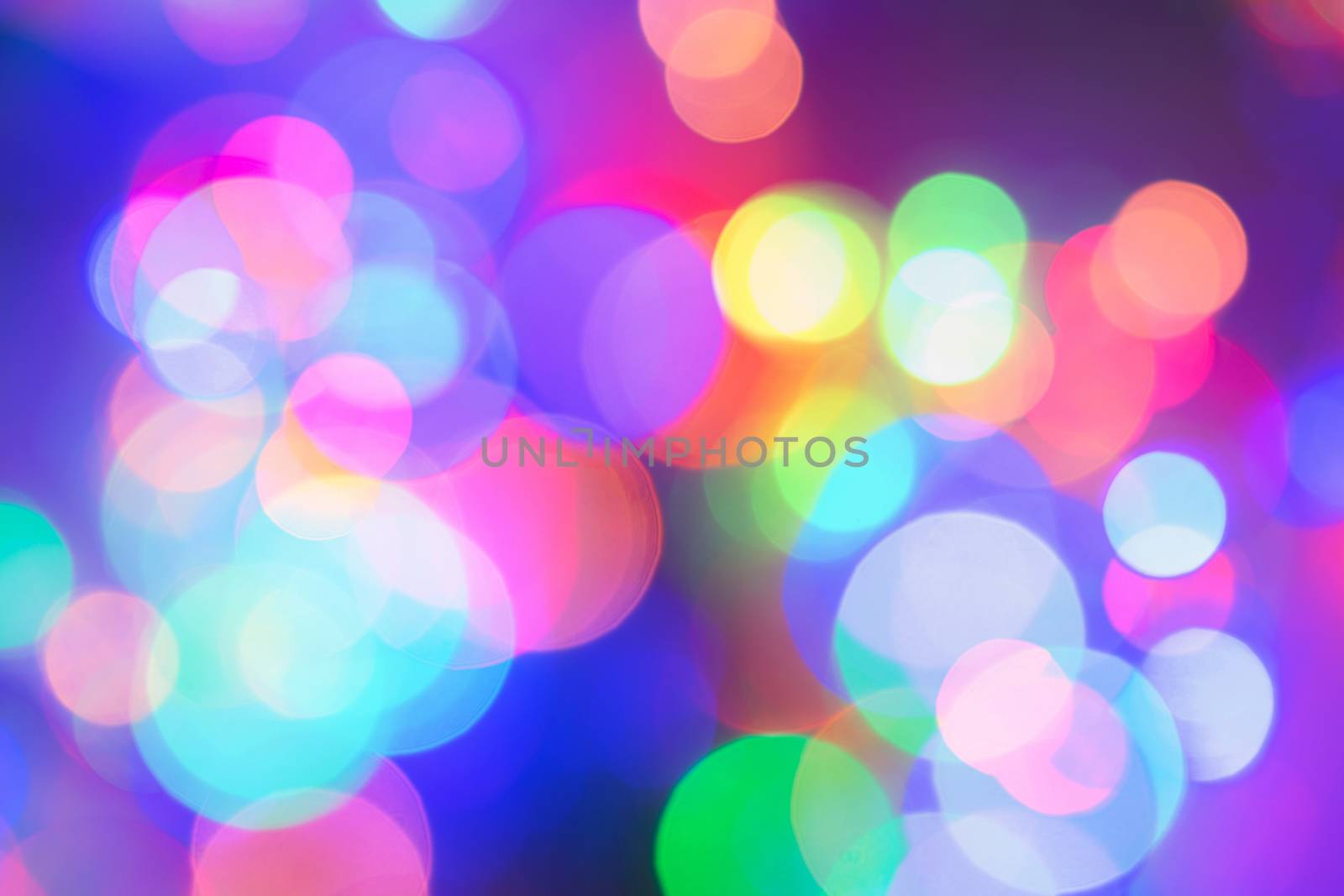 Colorful abstract blurred circular bokeh light of night city street for background. graphic design and website template design.