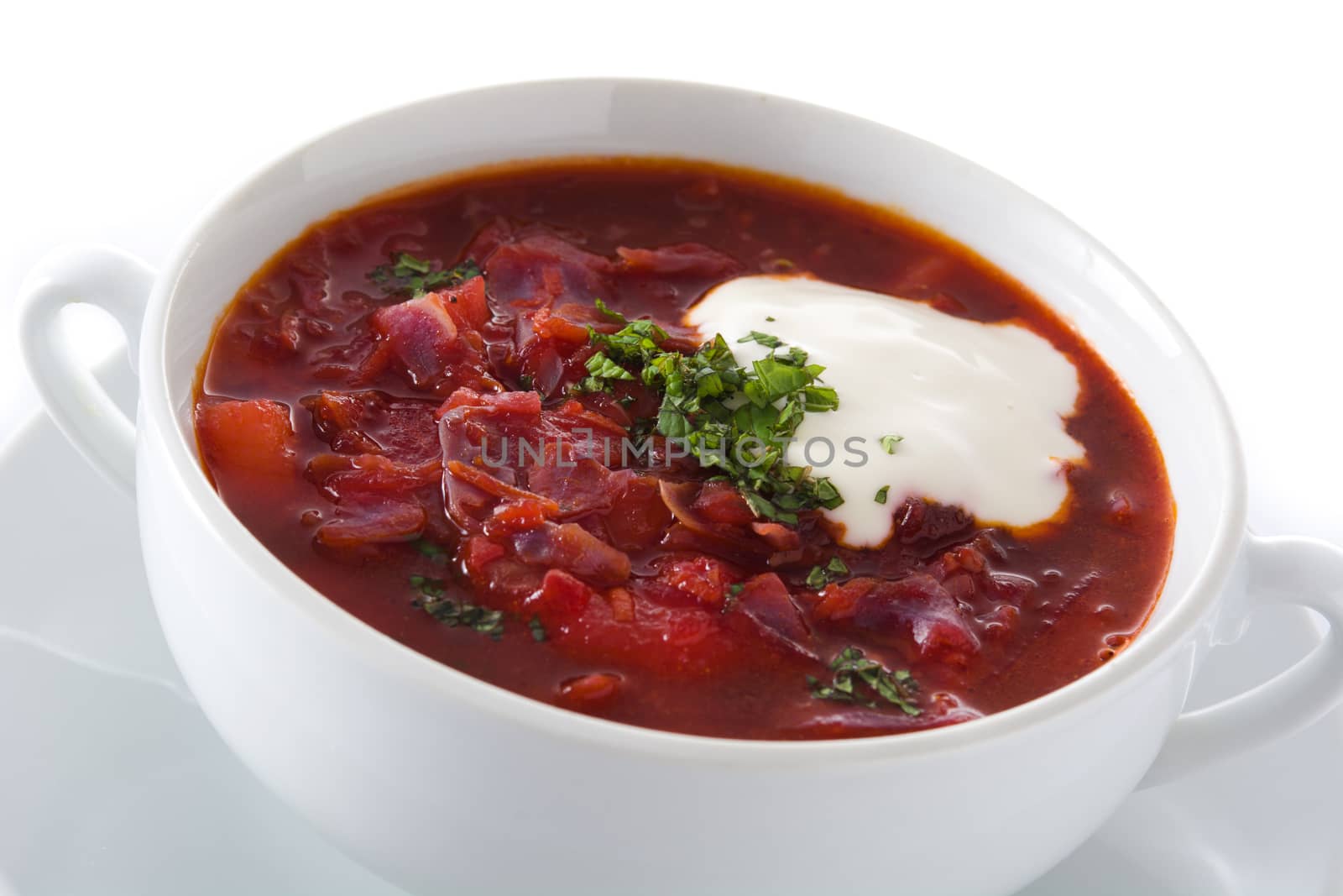 Traditional Ukrainian Russian borsch. Beetroot soup isolated on white background