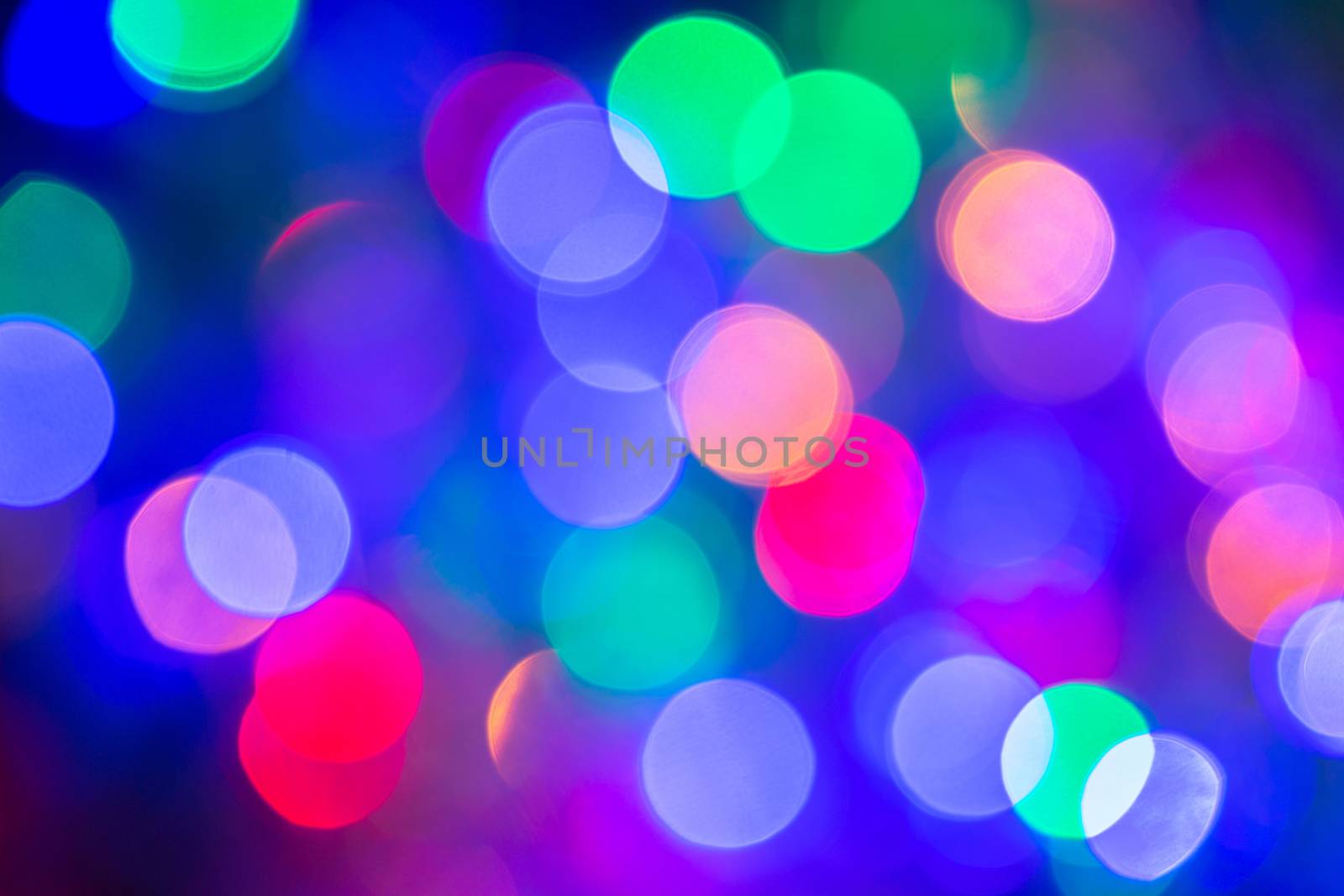 Colorful abstract blurred circular bokeh light of night city street. by phanthit