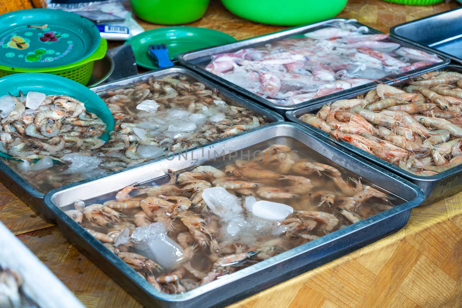 Fresh seafood on the counter at the fish market by the ocean