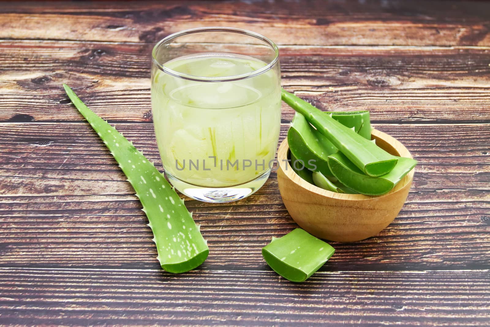 Aloe Vera for drinking on wood table 