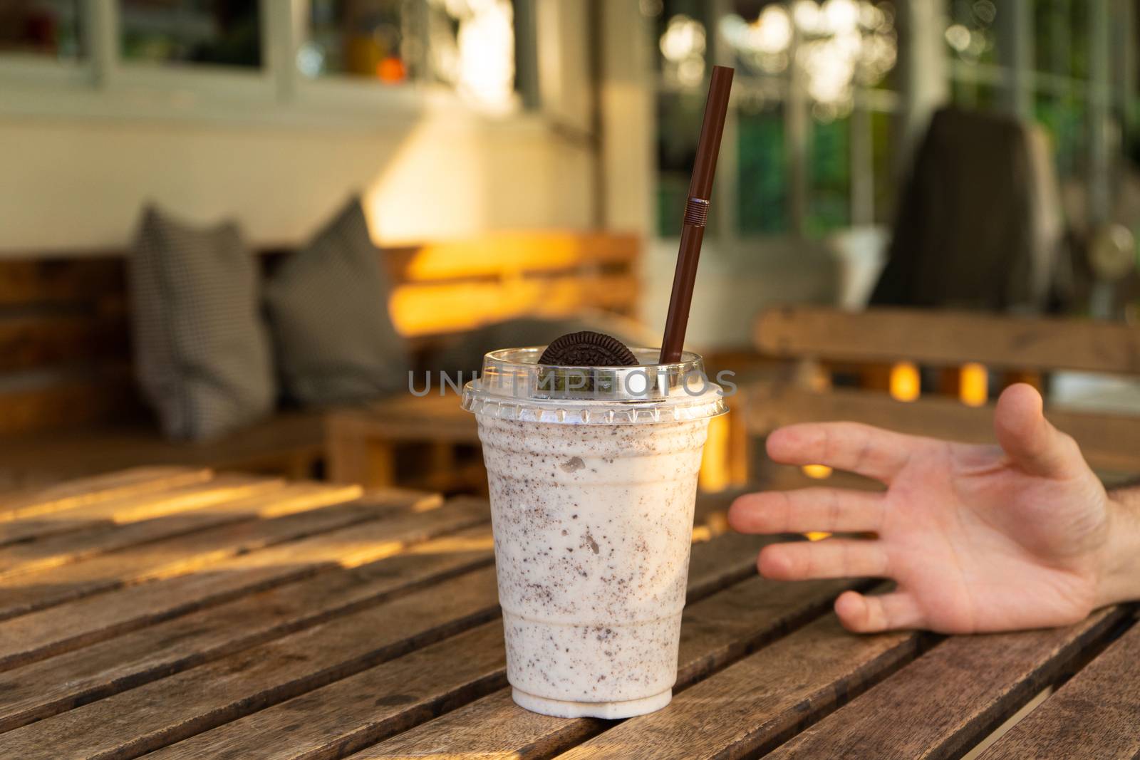 Milkshake with ice cream and oreo cookies. Cool and refreshing on a hot day.