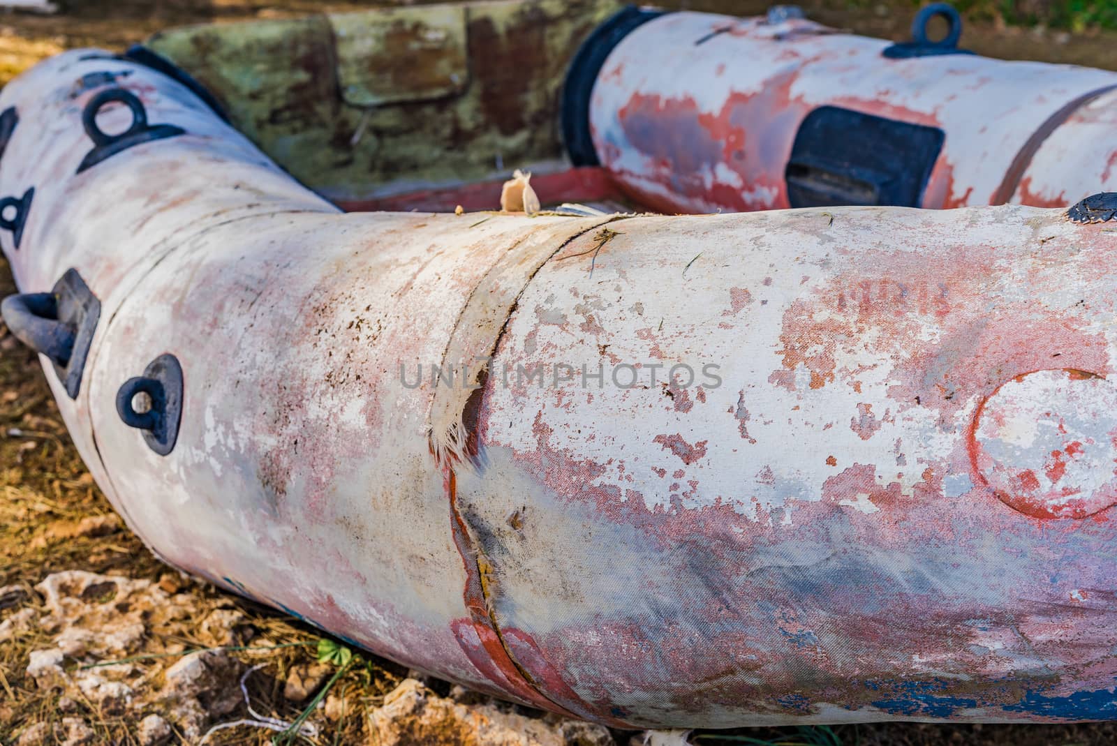 Close-up of old grunge inflatable rubber boat