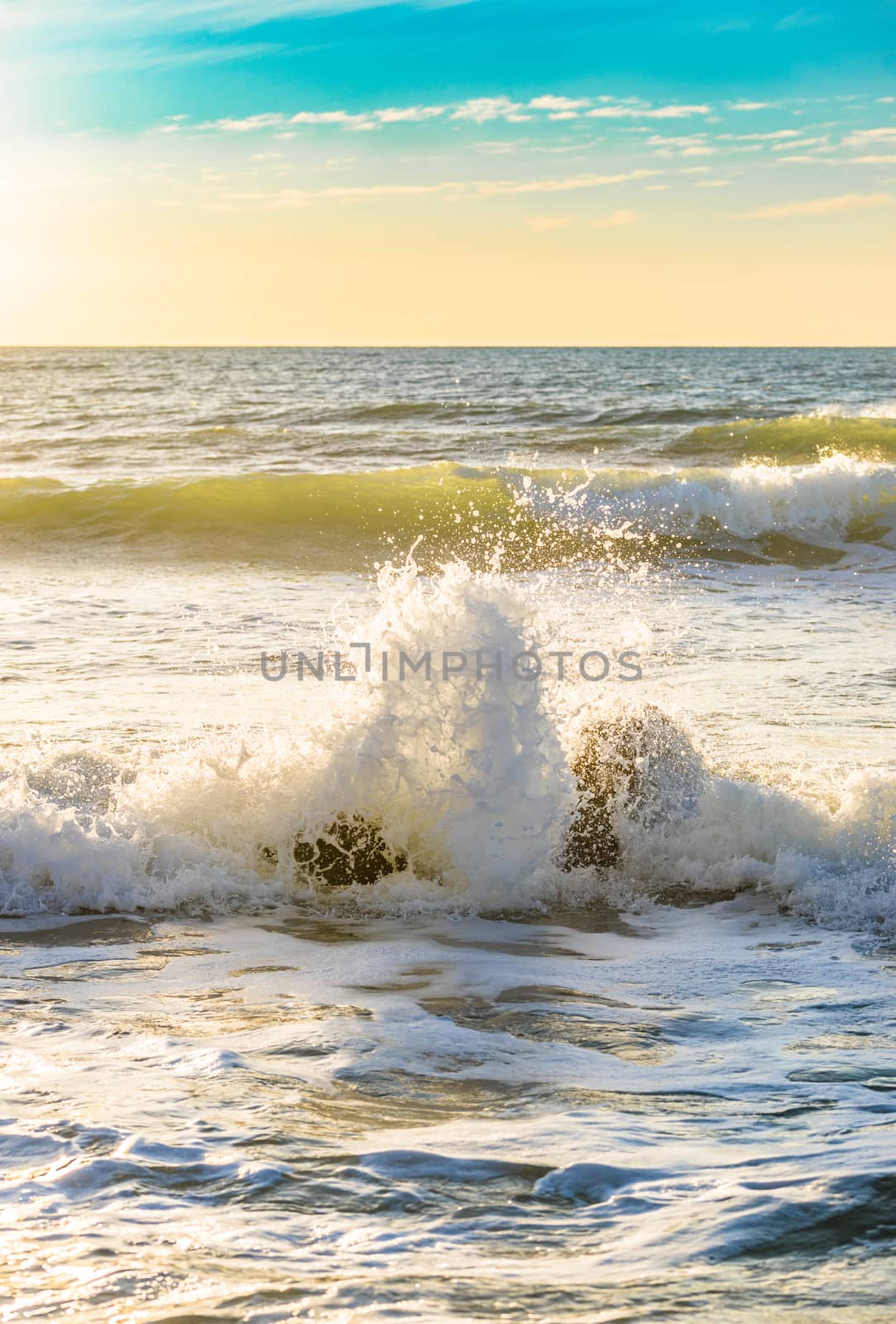 View of wavy seascape with beautiful light