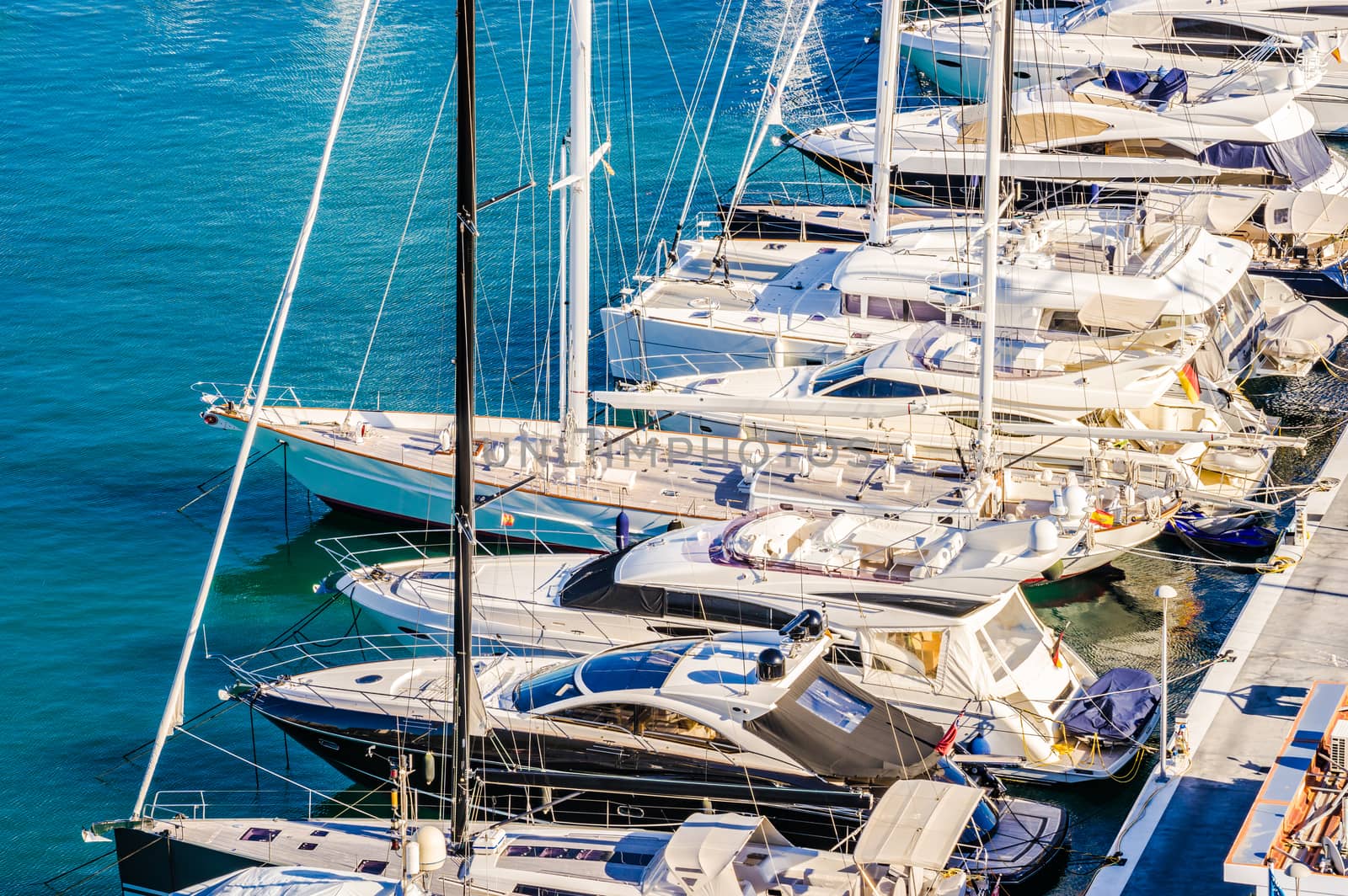 Luxury yachts boats anchored at marina, view from above