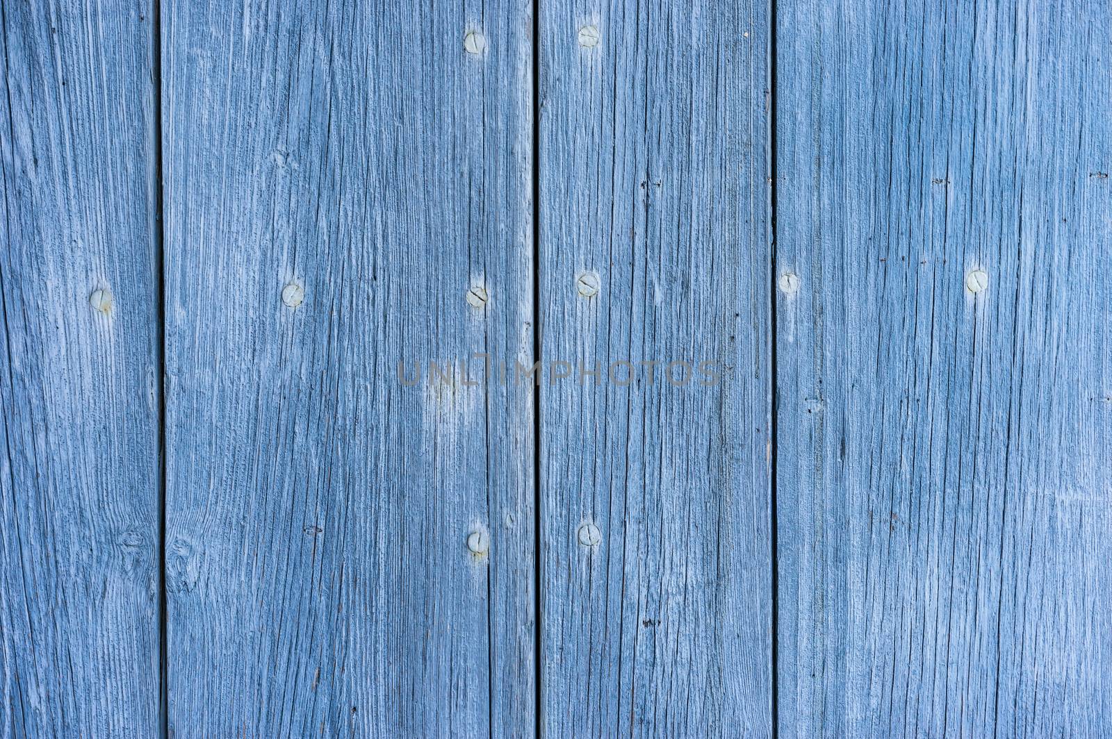 Dark blue colored wooden planks background texture with copy space