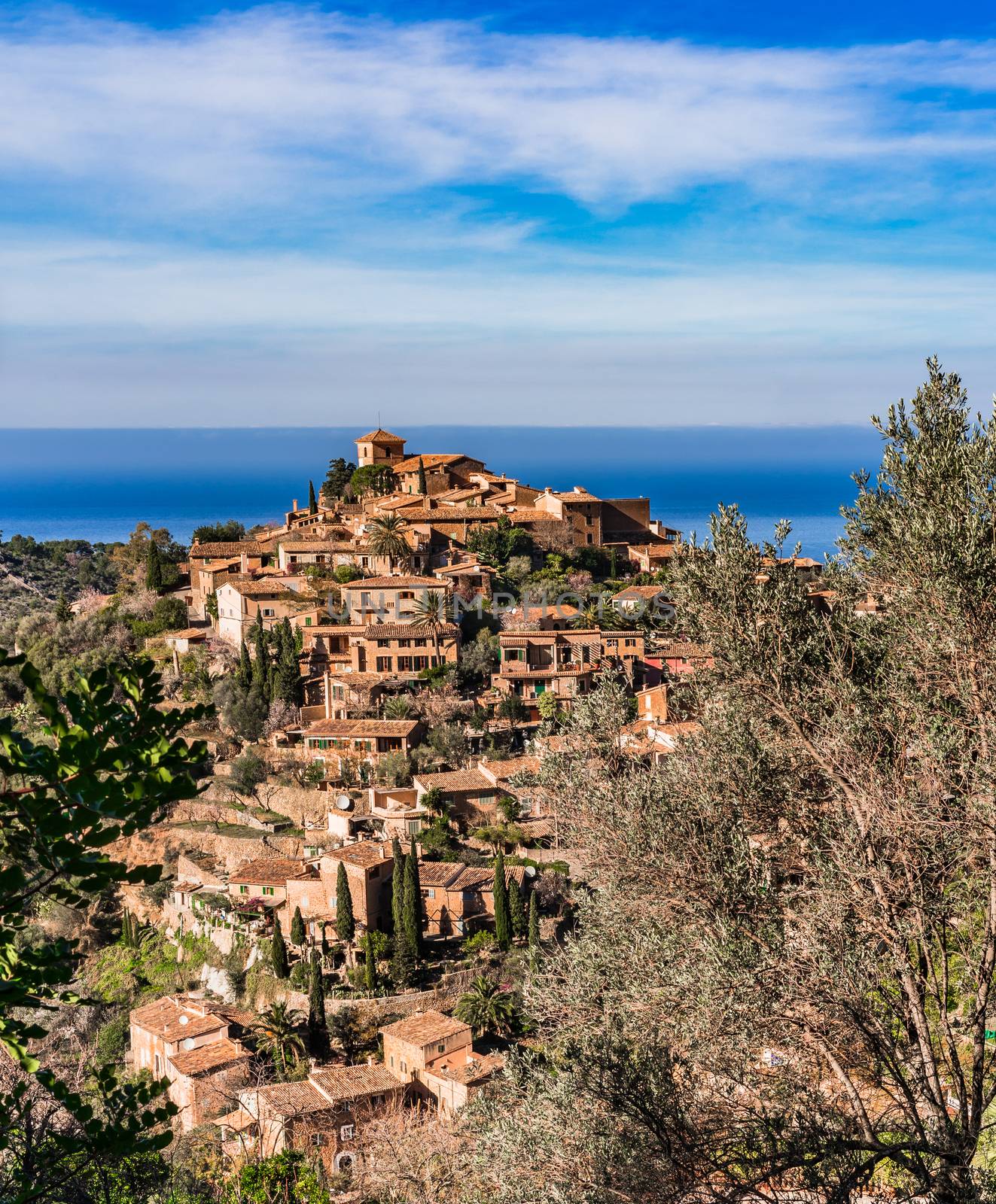 Spain Mallorca, view of the historic village of Deia with beautiful mediterranean landscape

