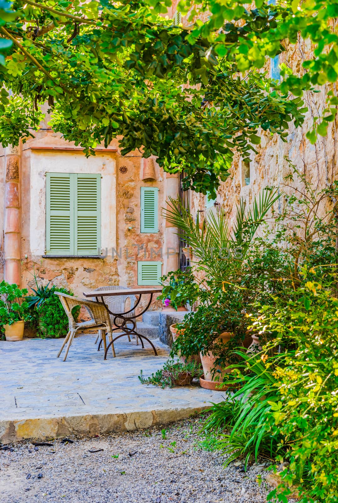 Idyllic view of mediterranean garden house terrace patio by Vulcano