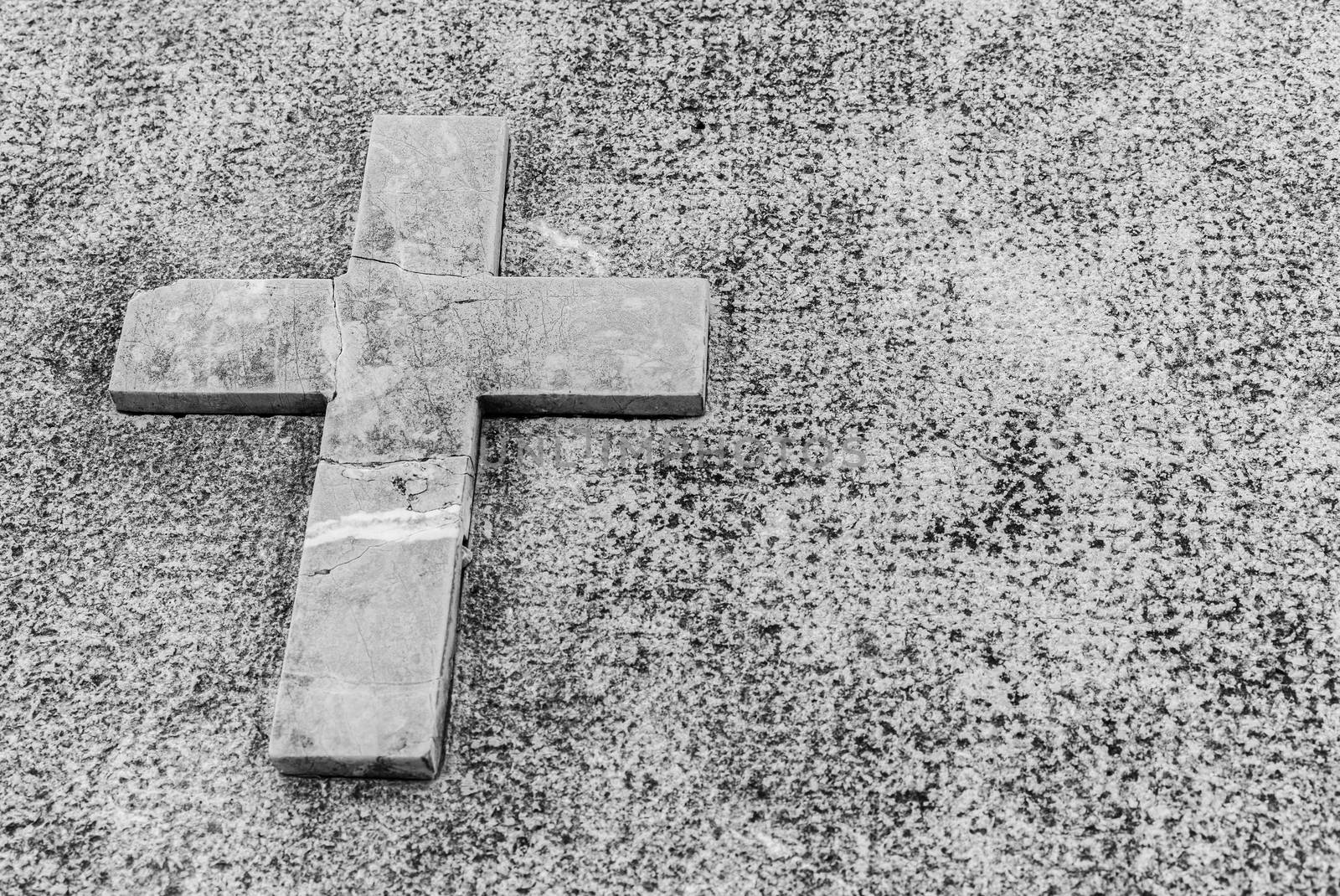 Gray tombstone with stone cross, dead grief background with copy space