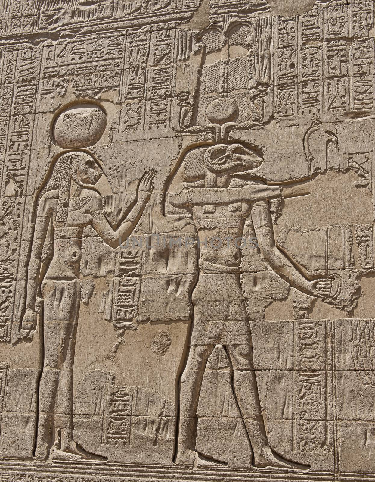 Hieroglypic carvings on wall at the ancient egyptian temple of Khnum in Esna