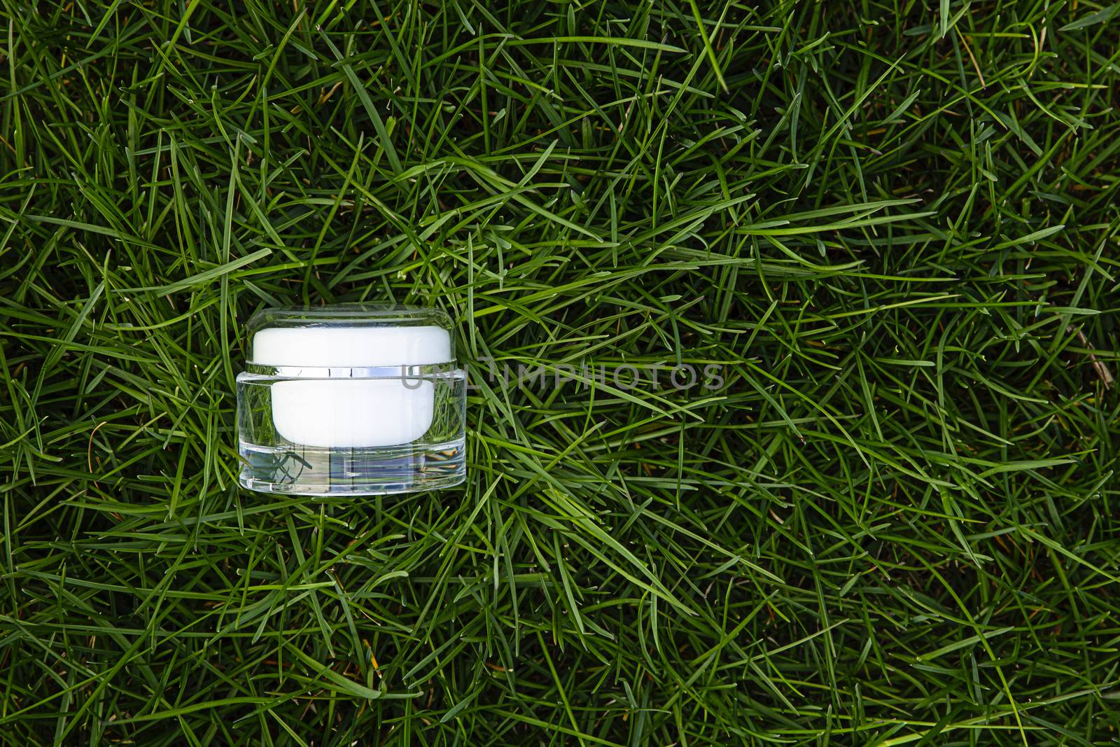 Beauty cream on the grass by mypstudio