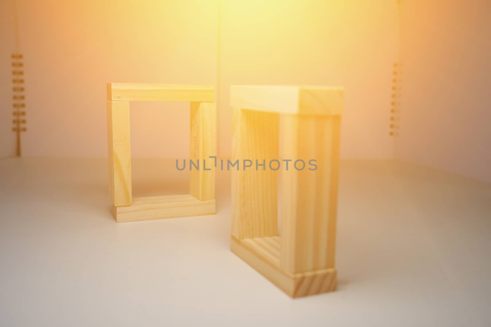 Wooden blocks, used for domino games. There is sunlight above the photo. by ViktorAxelsen