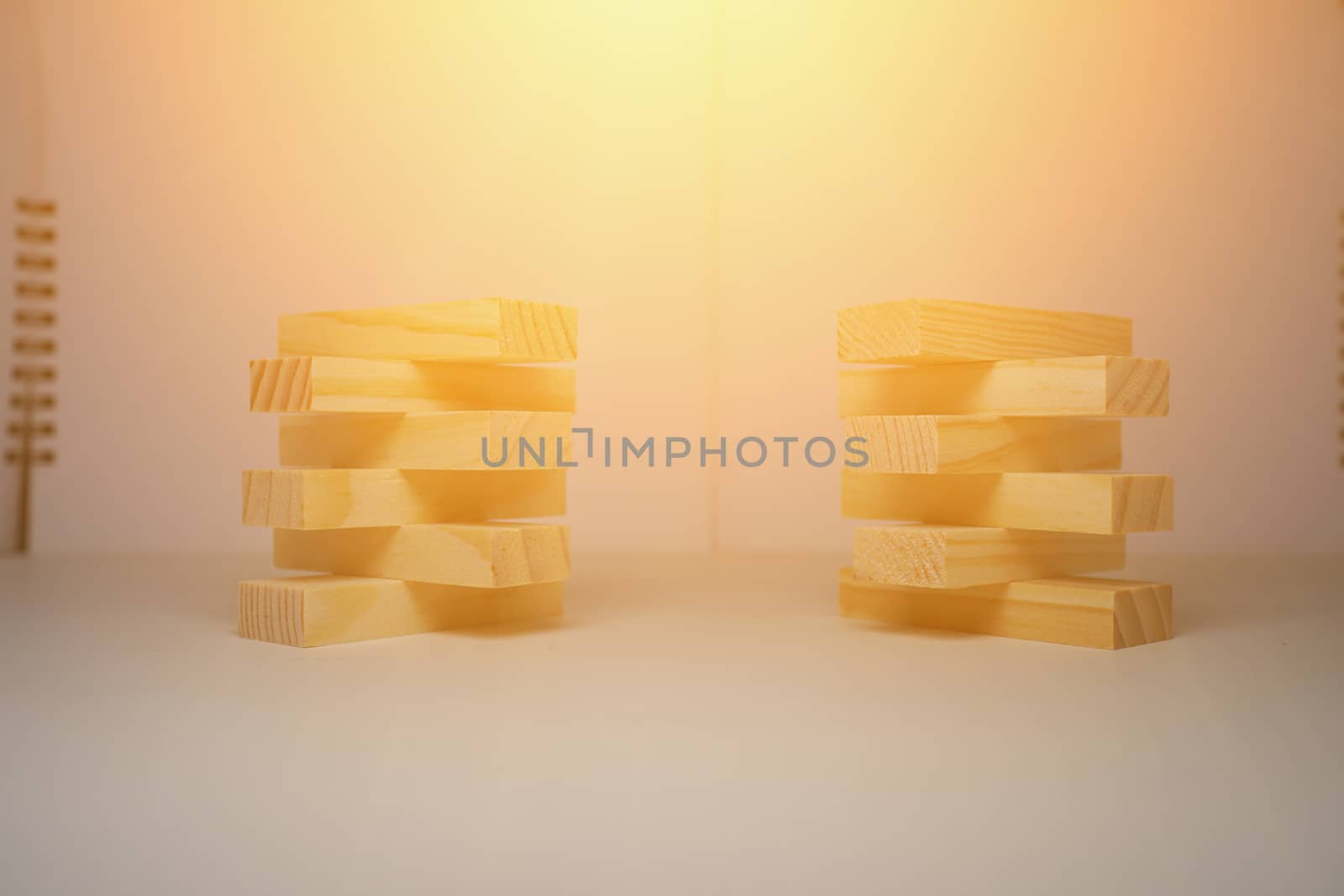 Wooden blocks, used for domino games. There is sunlight above the photo. by ViktorAxelsen