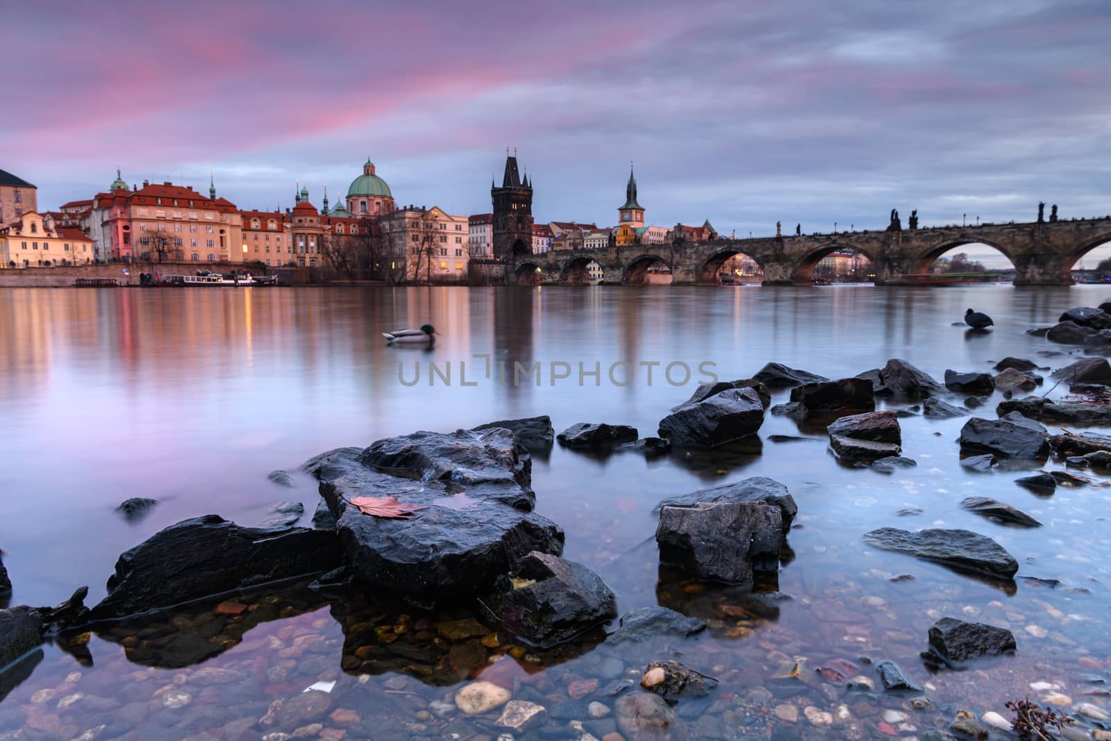 view of Charles Bridge in Prague at sunset