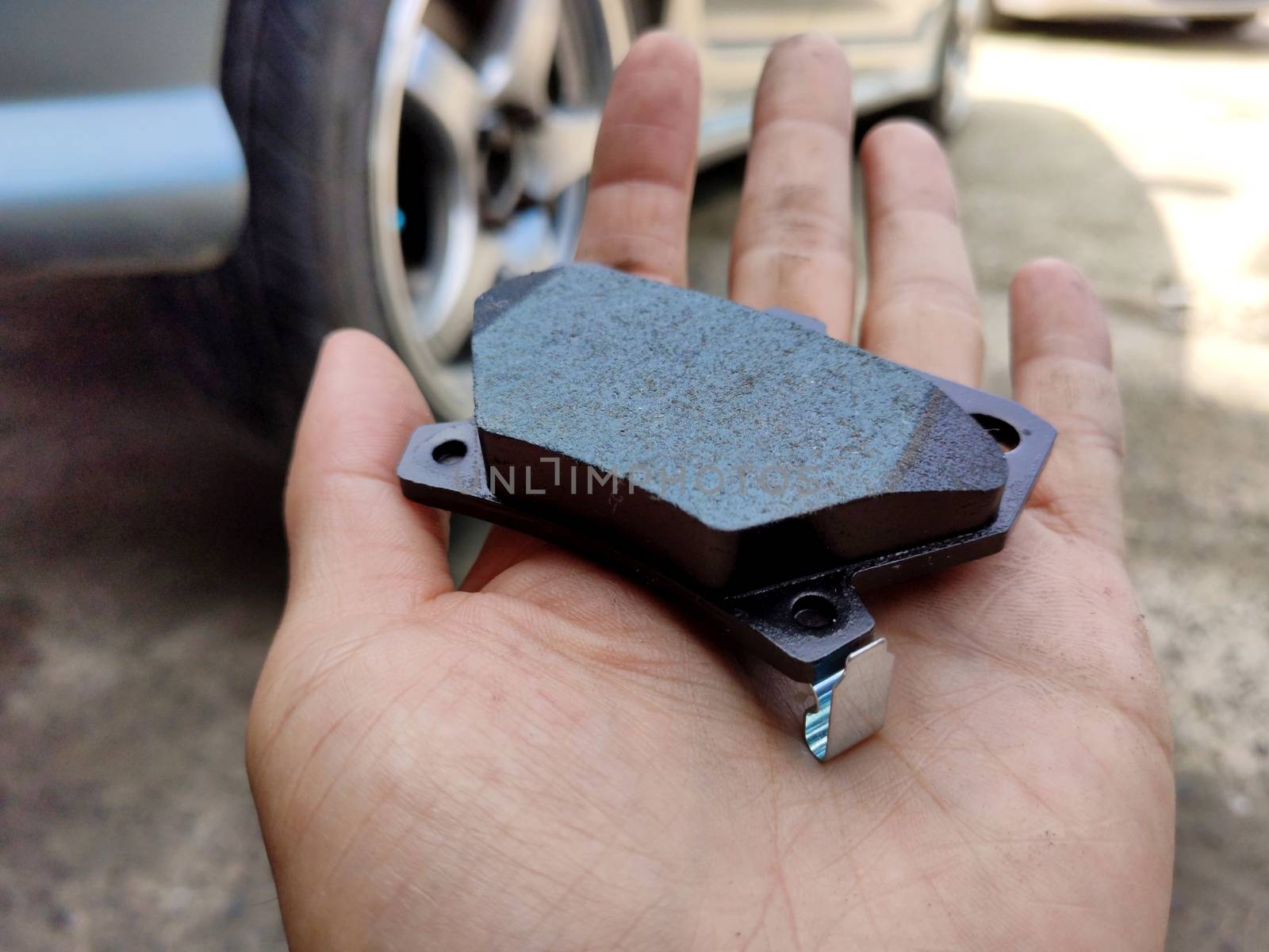 close up to brake pad of the car