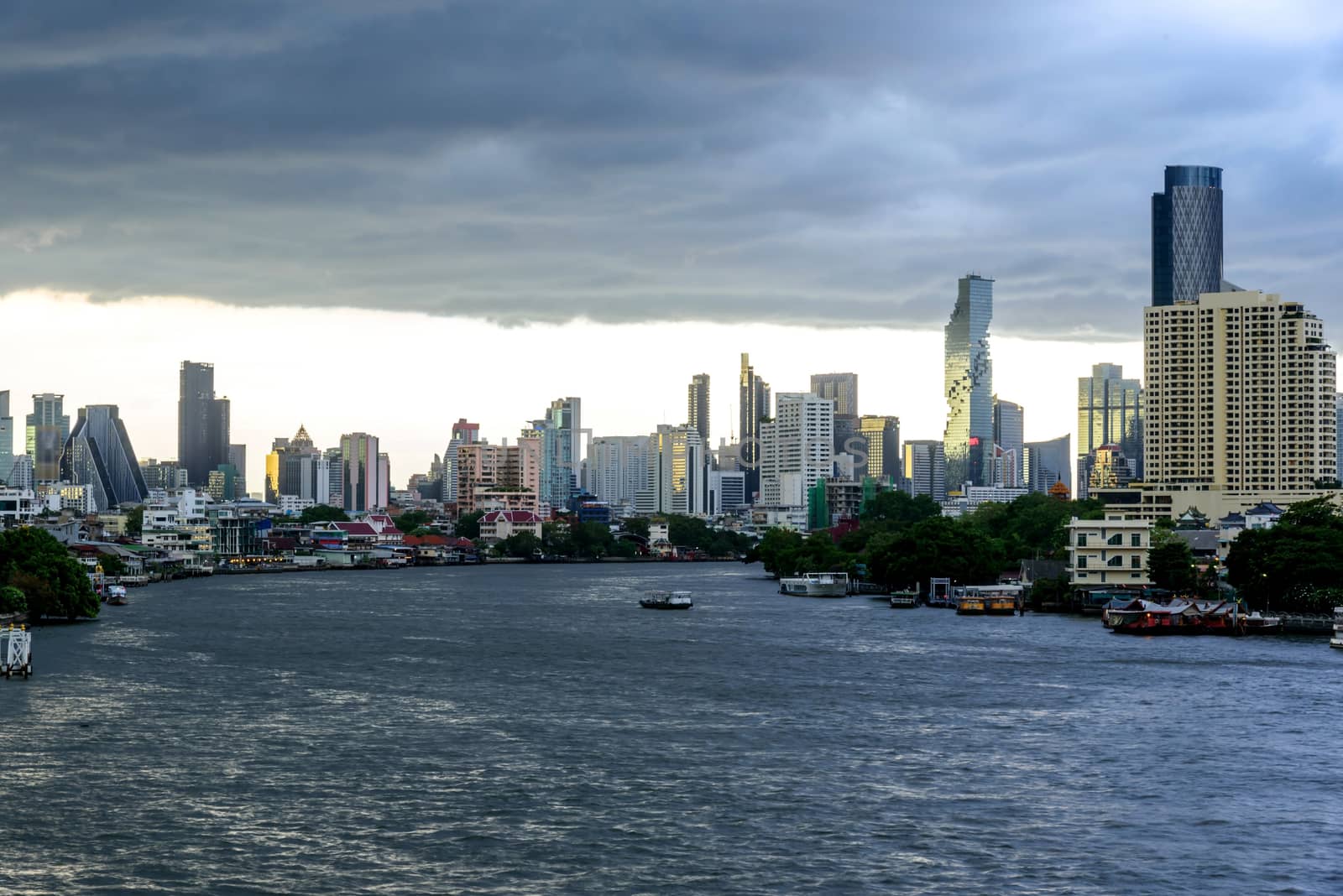 high view of river with dark cloud in the city