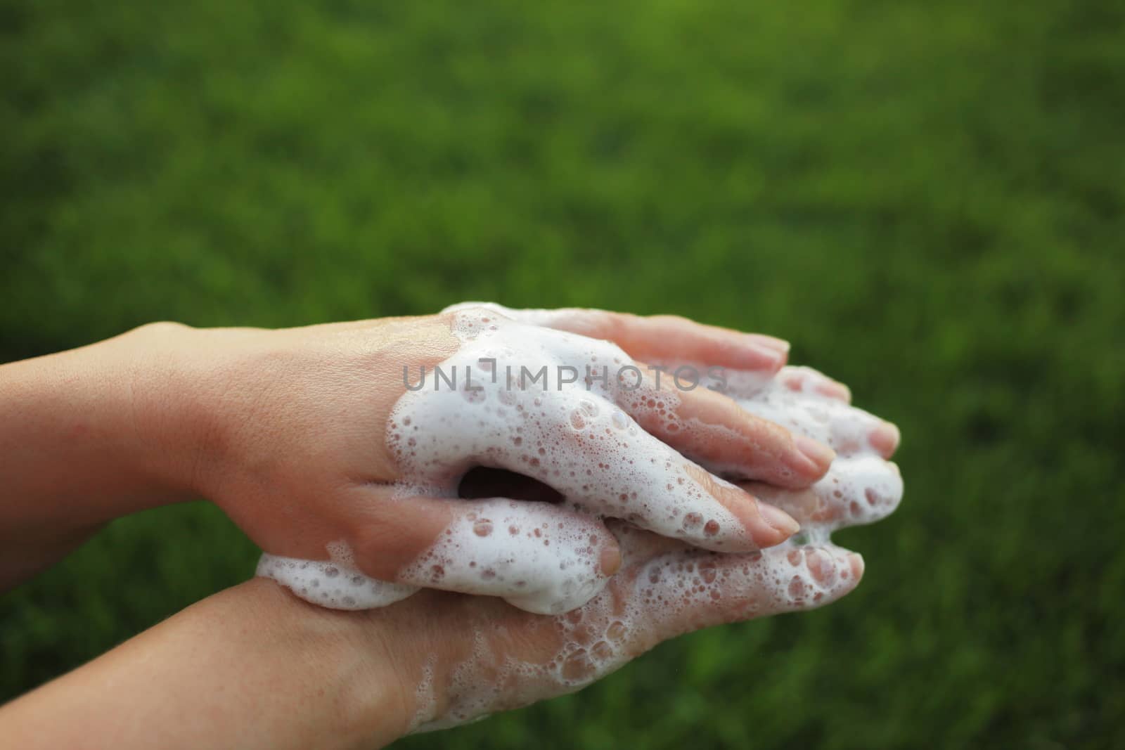 Washing hands rubbing with soap man for corona virus prevention, hygiene to stop spreading coronavirus. Death to germs. You need to make sure that microbes have a zero chance. High quality photo
