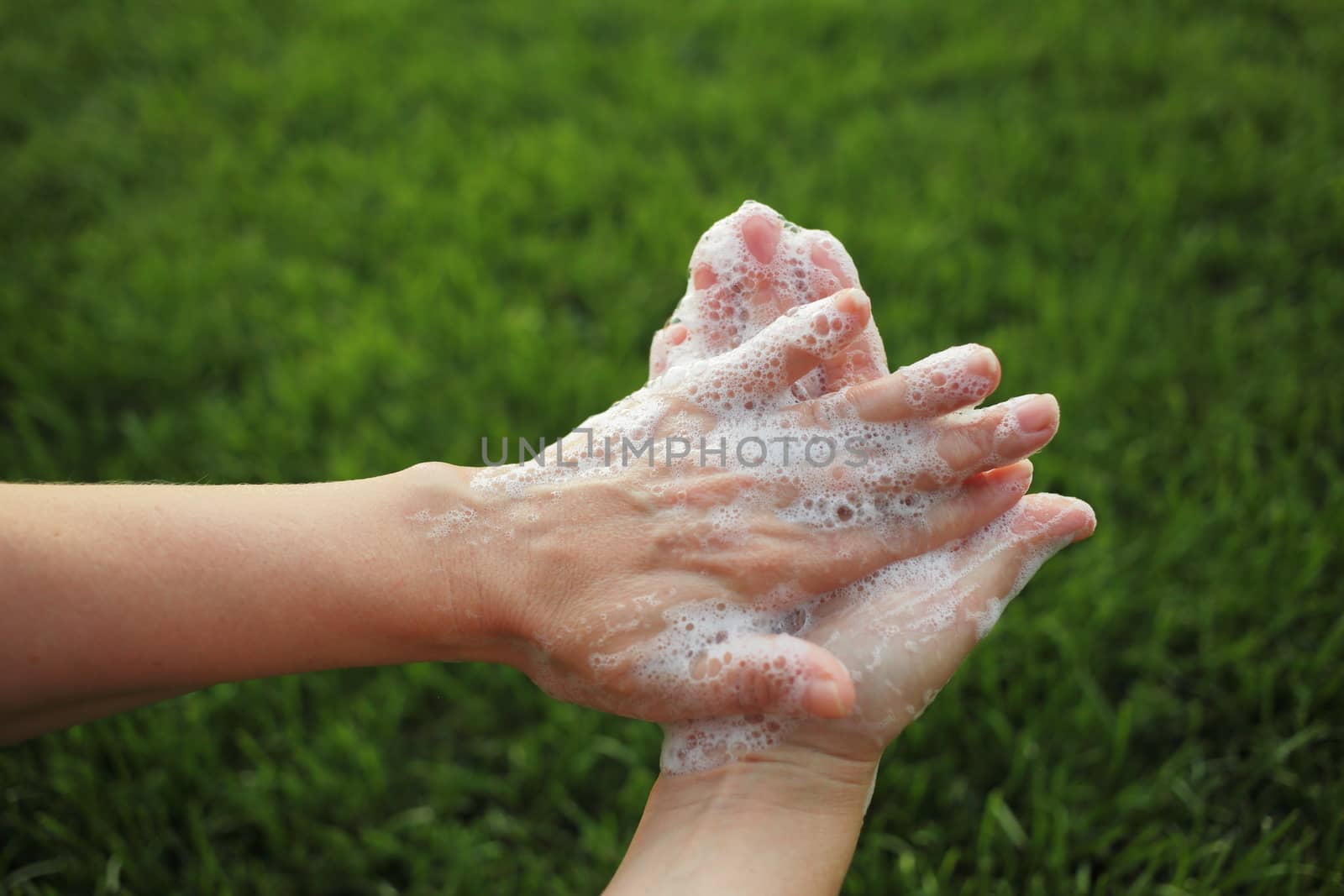 Washing hands rubbing with soap man for corona virus prevention, hygiene to stop spreading coronavirus. Death to germs. You need to make sure that microbes have a zero chance. High quality photo