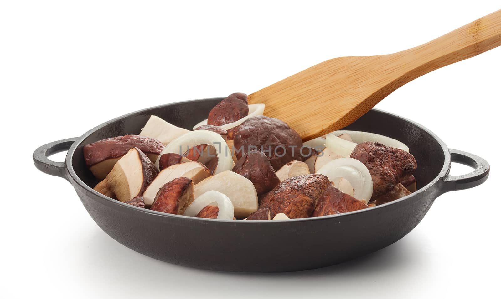 White mushrooms in the black iron pan by Angorius