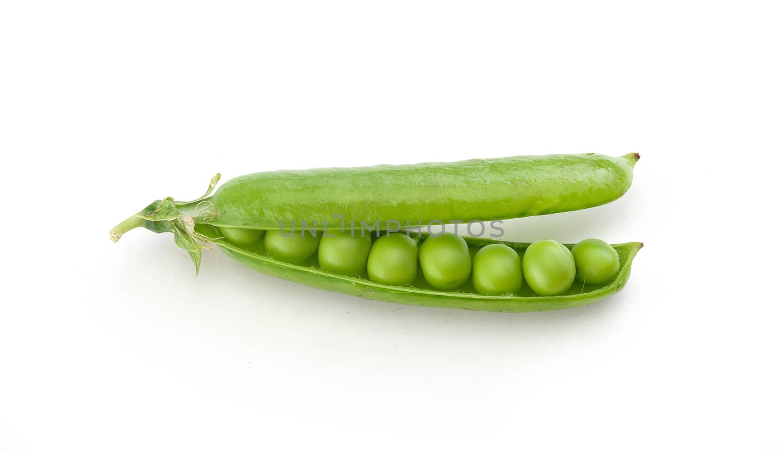Top view of fresh green pea pod with peas on the white background