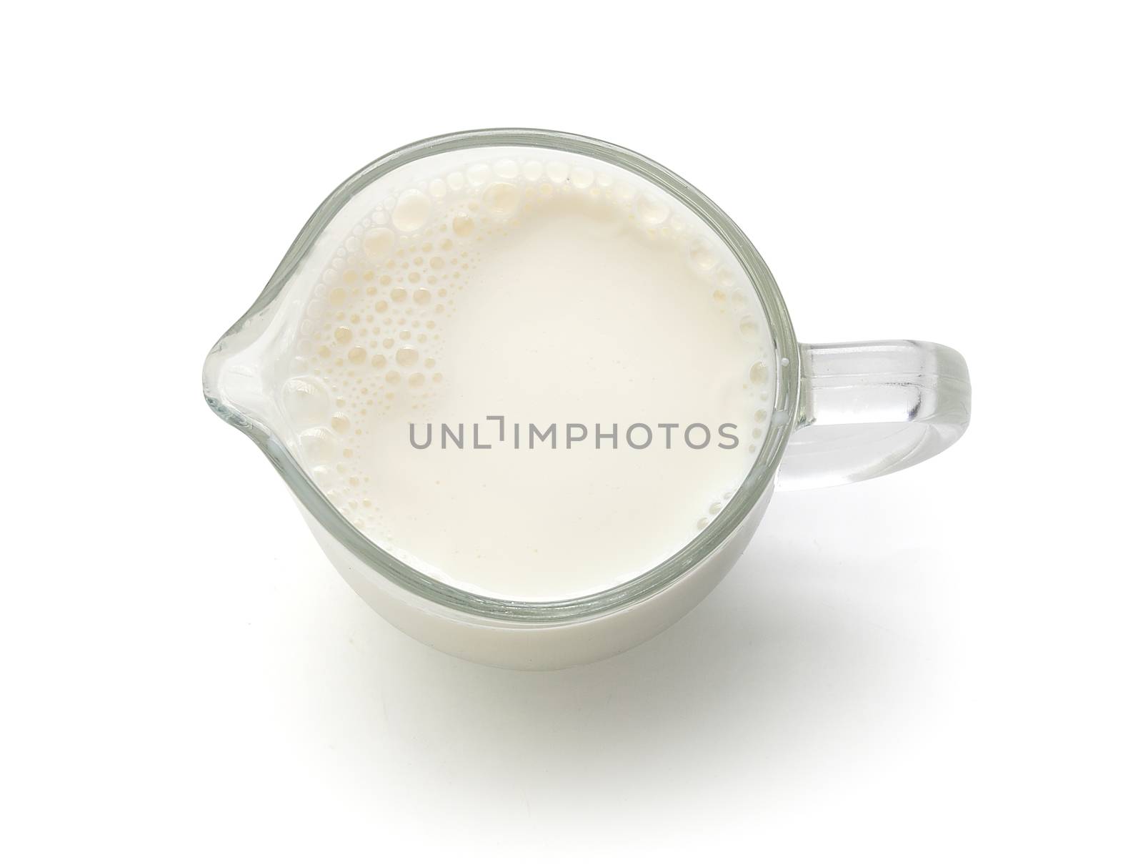 Milk jug with milk by Angorius