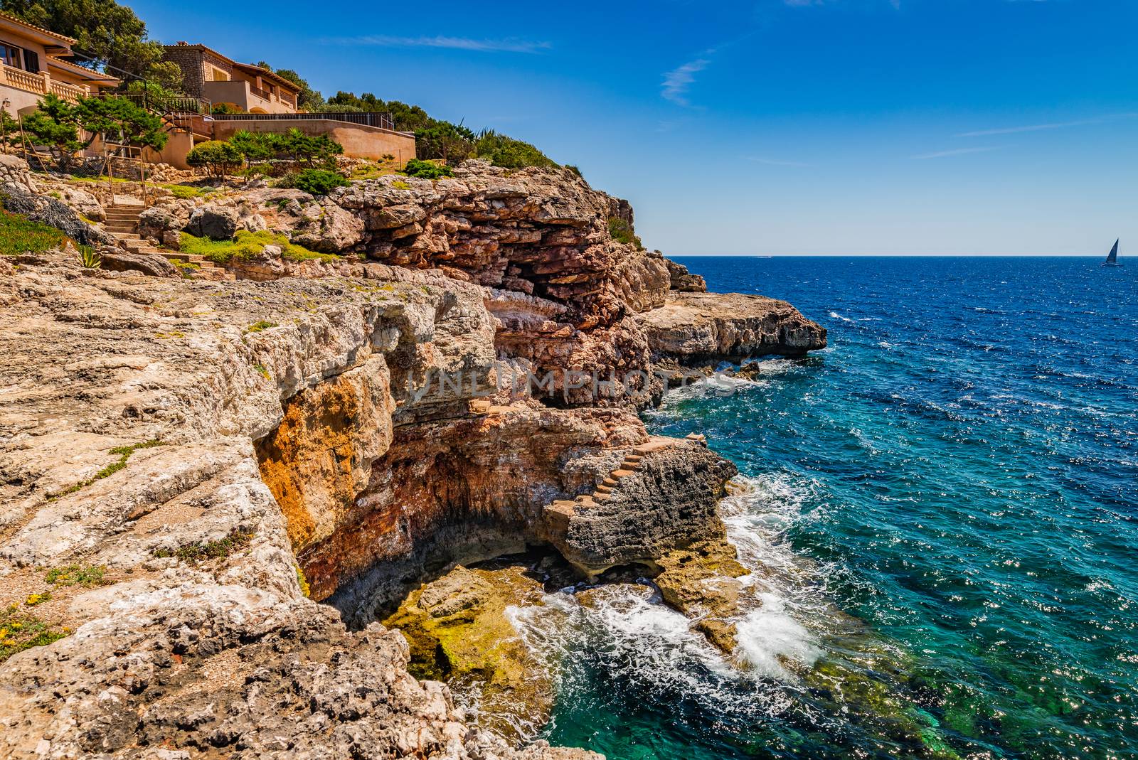 Rough rocks cliffs at the coast on Majorca, Spain Mediterranean Sea