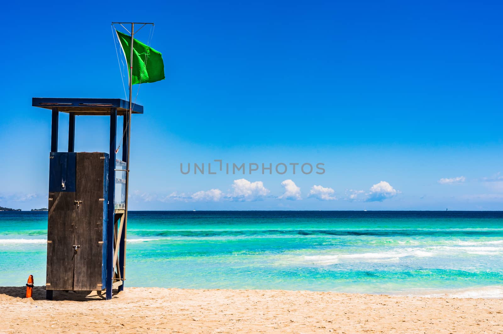 Beautiful beach with lifeguard tower for summer holiday background