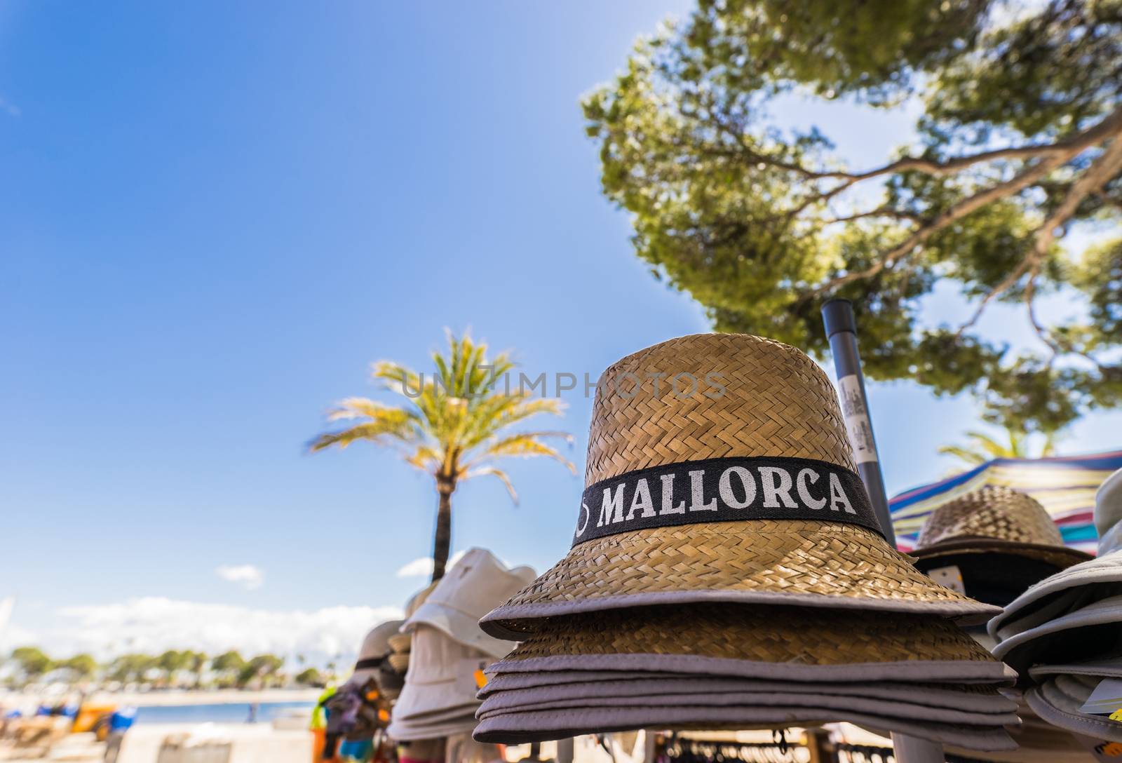 Summer sun hat, head accessory and souvenir on Mallorca island, Spain Mediterranean Sea