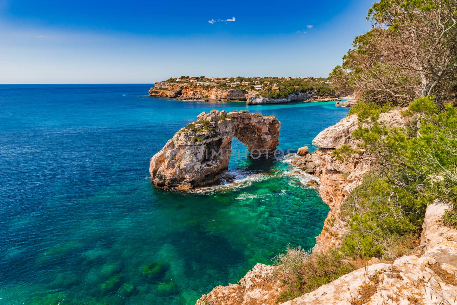 Spain Mediterranean Sea, beautiful view of the natural landmark Es Pontas, natural rock arch on Mallorca island