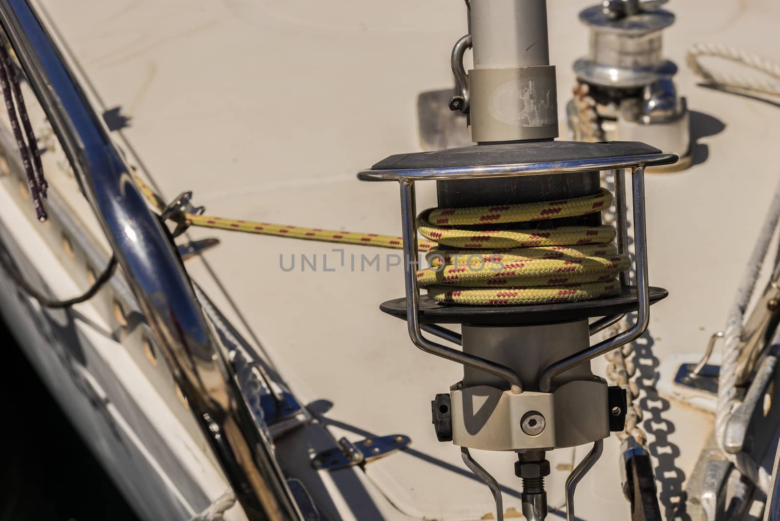 Winch and rope, sailing yacht detail view, close-up