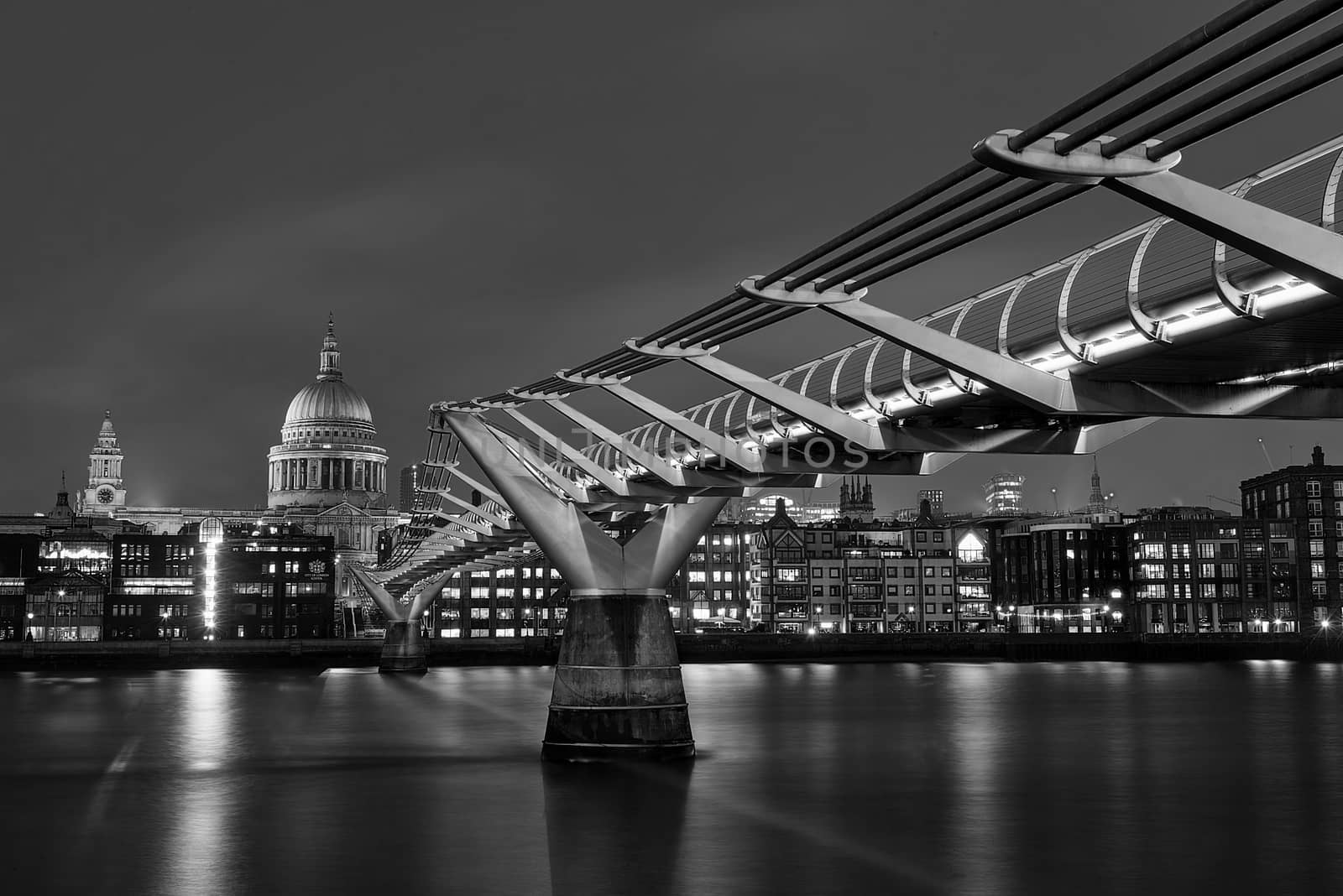London, UK - Jan 2020: St Paul's Cathedral along the length of Millennium Bridge, Black and White
