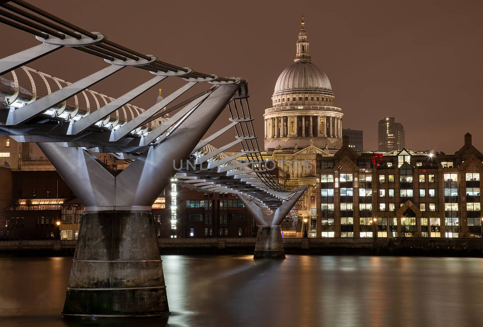 London, UK - Jan 2020: St Paul's Cathedral along the length of Millennium Bridge