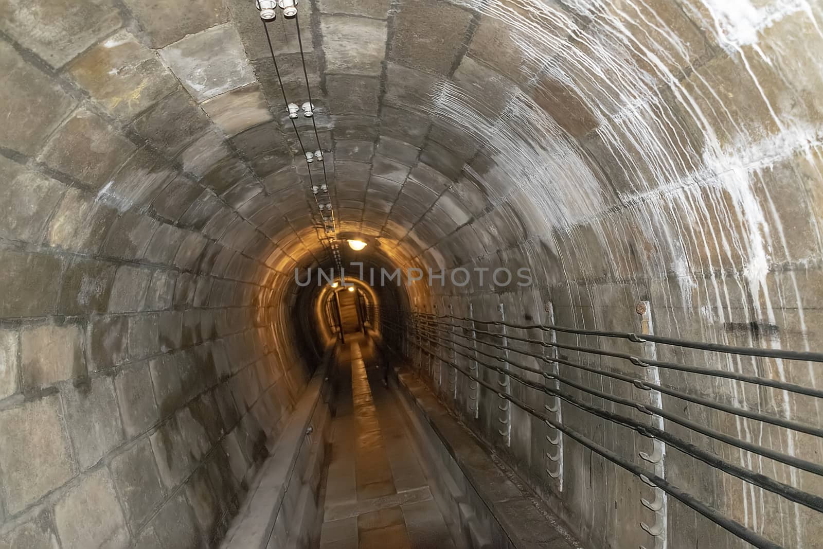 France, Alsace, June 2015:  Tunnel connecting underground constructions at Fort de Mutzig, Fortress of Kaiser Willheim II, dutch tilt