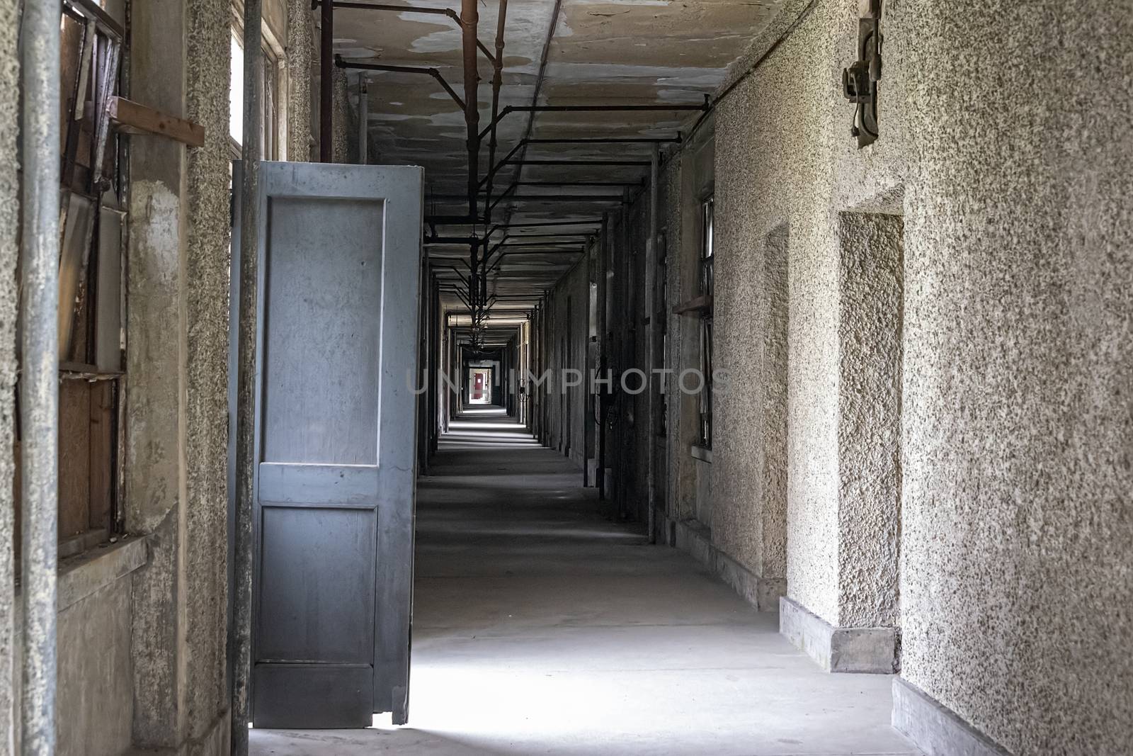 USA, New York, Ellis Island - May 2019: Entrace to the corridor of an abandoned hospital building