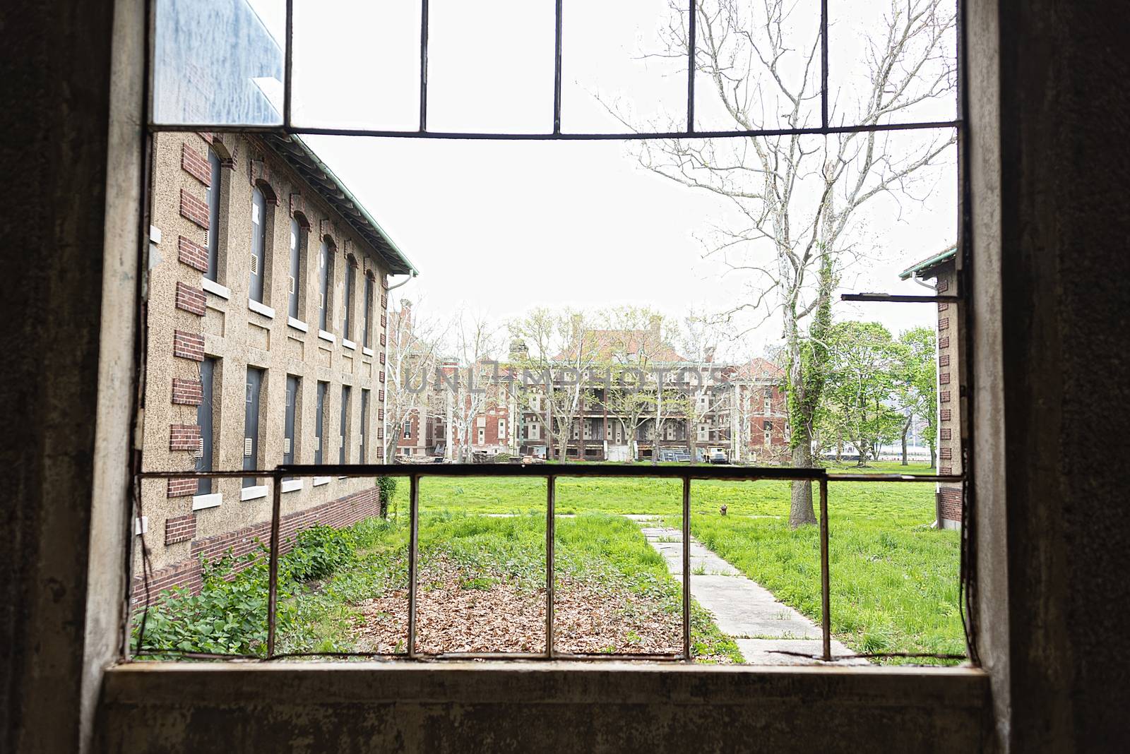 USA, New York, Ellis Island - May 2019: View across the campus of the hospital wings at the Immigration centre