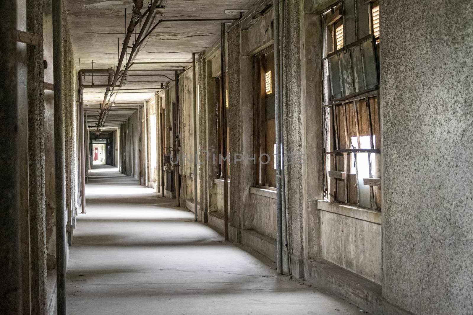 USA, New York, Ellis Island - May 2019: Corridor in abandoned hospital building