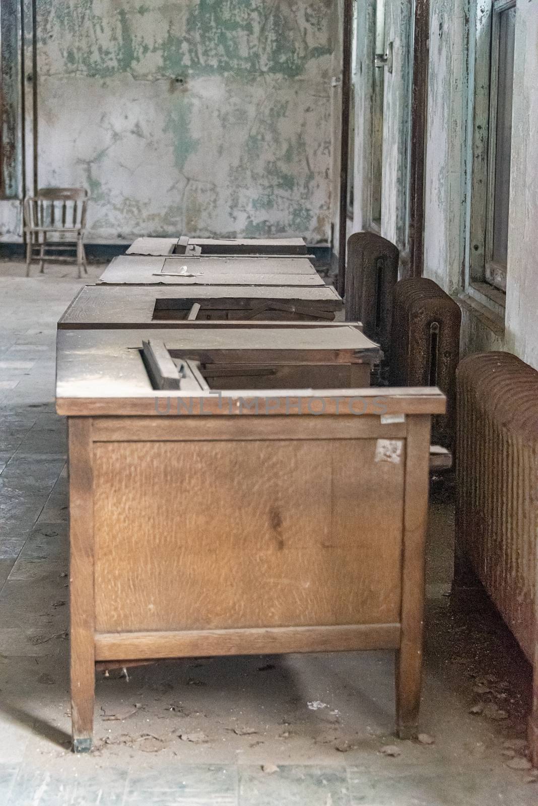USA, New York, Ellis Island - May 2019: Old furniture abandoned in a derelict building