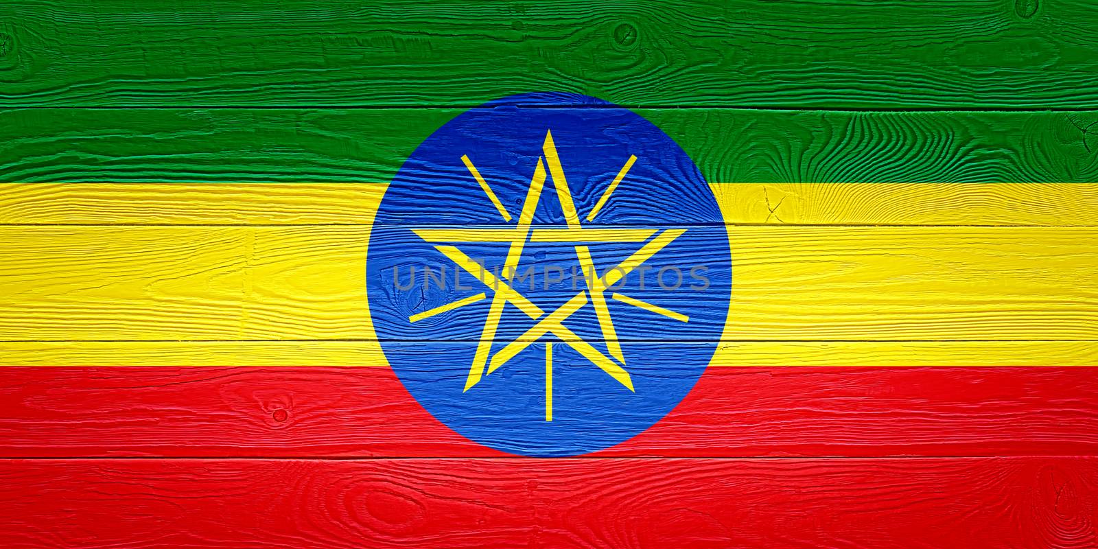 Ethiopia flag painted on old wood plank background. Brushed wooden board texture. Wooden texture background flag of Ethiopia
