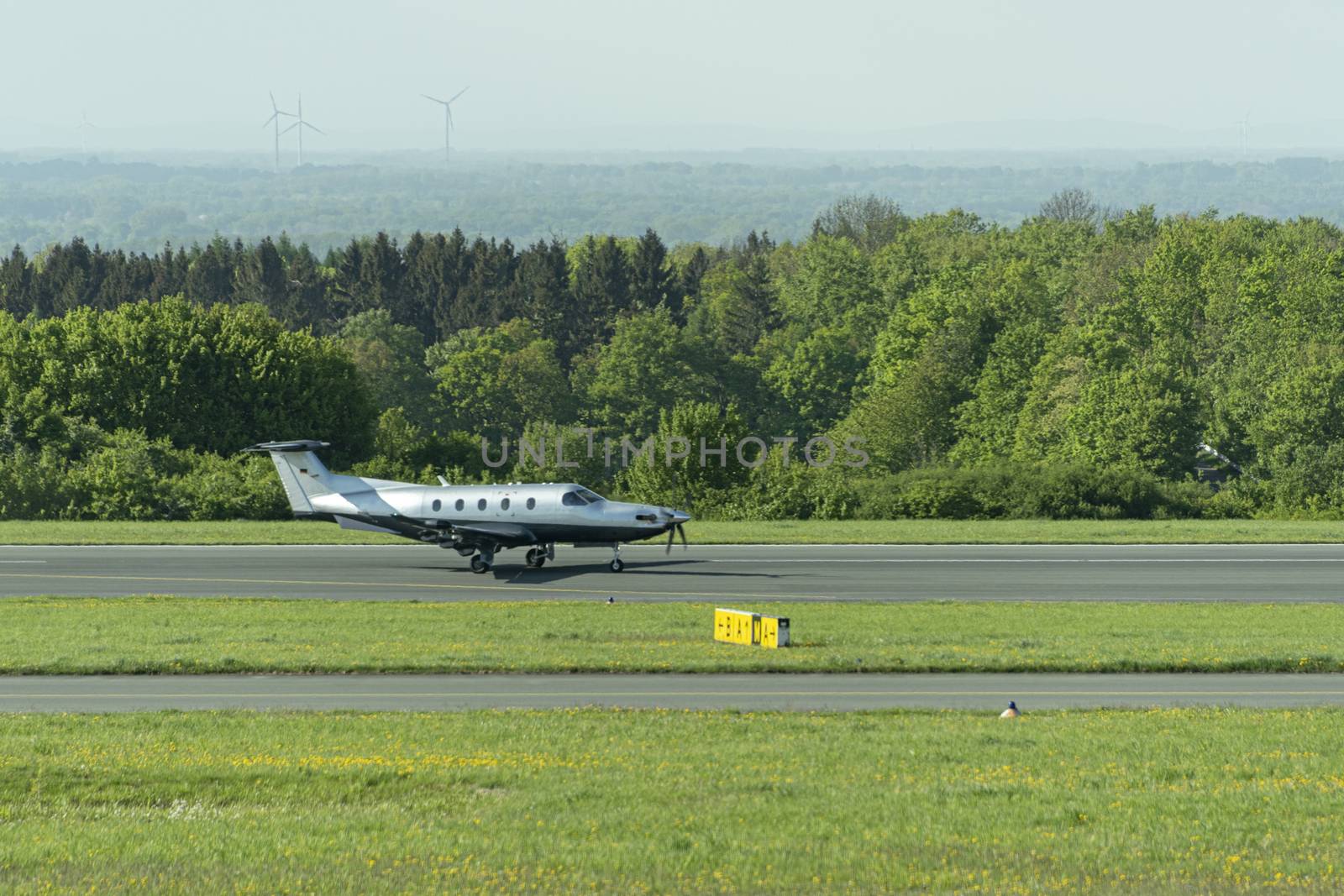 DE, North Rhine-Westphalia - April 2018: Privately owned Twin Propeller PILATUS Eagle, taxis after landing at Paderborn Airfield