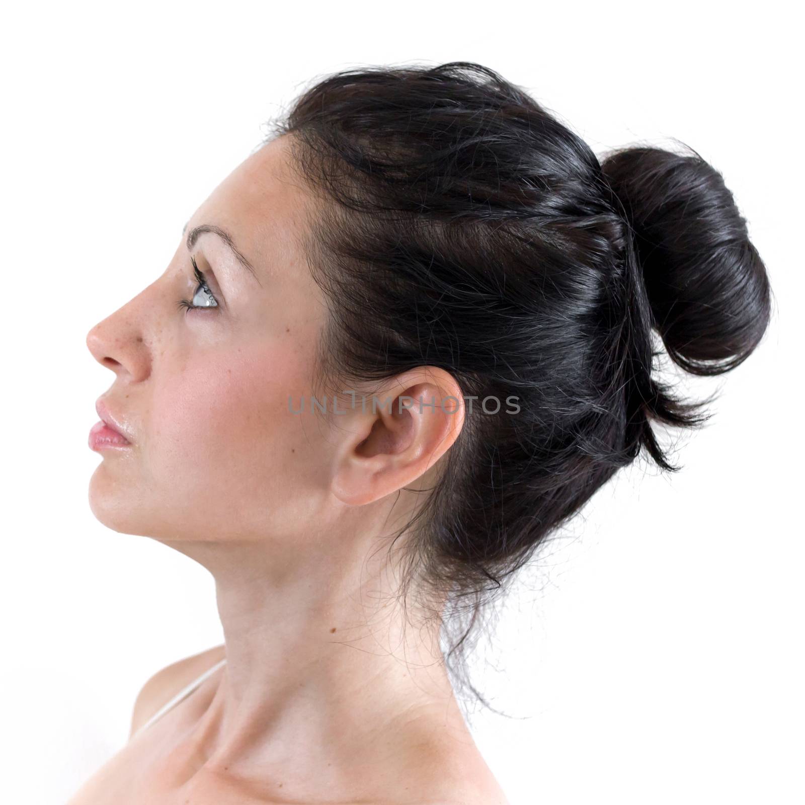 Profile of young woman's face with clean healthy skin.