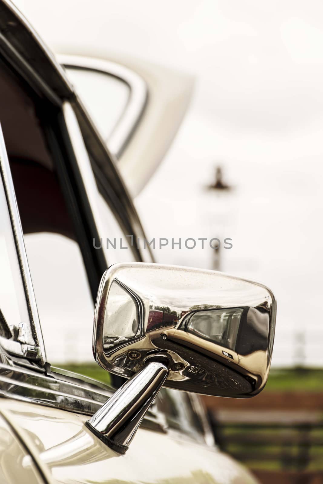 Chrome wing mirror of a restored Austin Marina  by mrs_vision