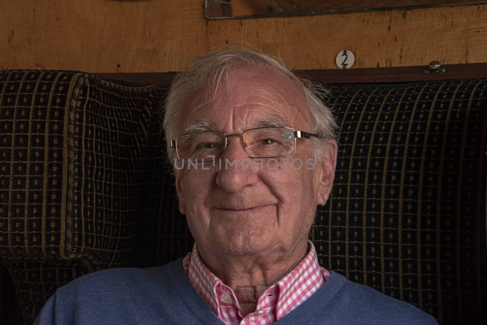 UK, LEICESTERSHIRE - JUNE 2018: Elderly man smiles into camera 