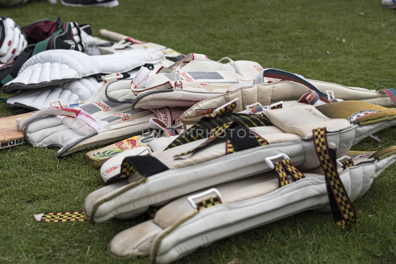 LOUGHBOROUGH, UK - July 2017 - cricket equipment piled up ready for use at a local charity cricket match