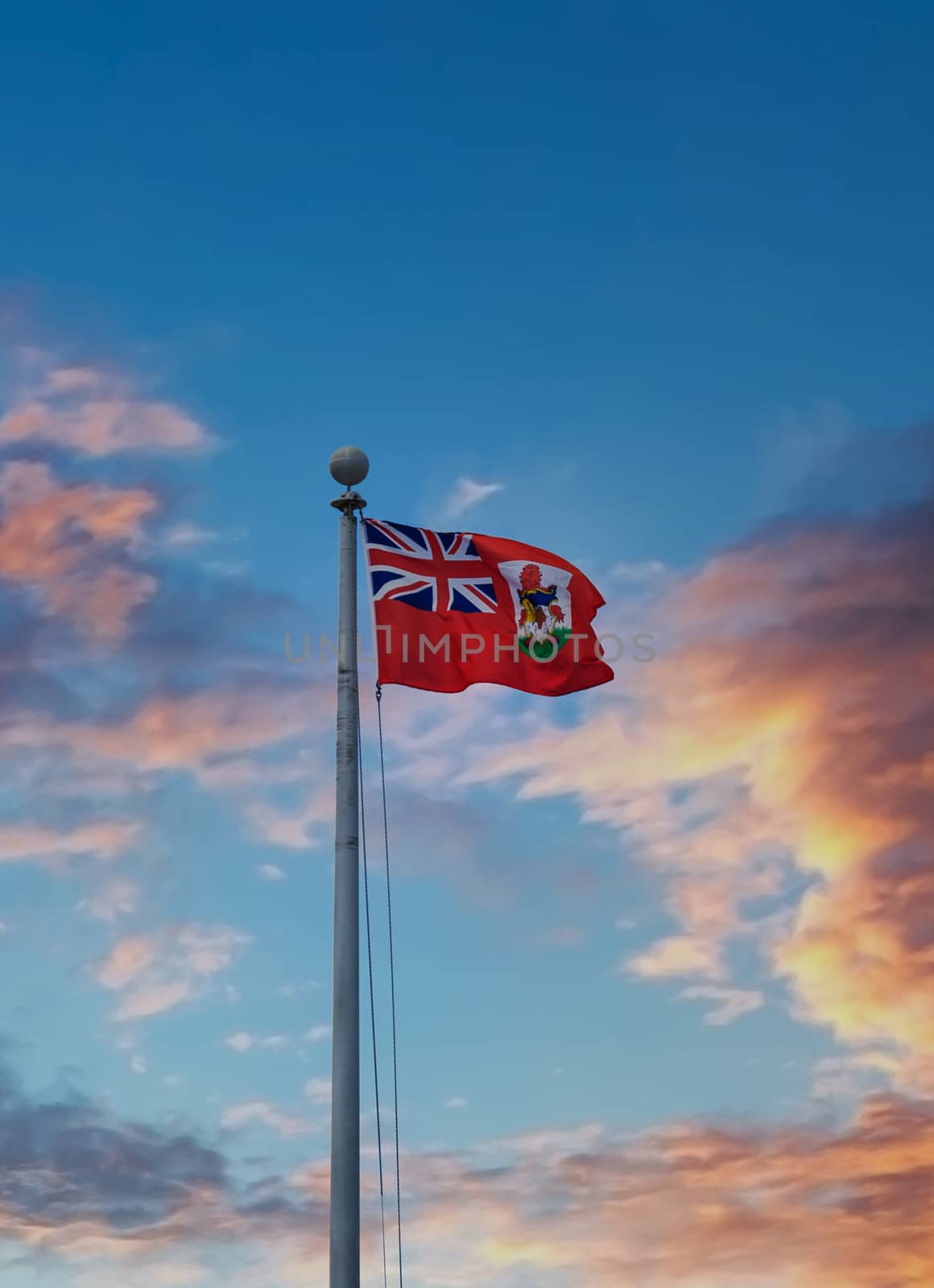 Bermuda Flag Over Sunset Sky
