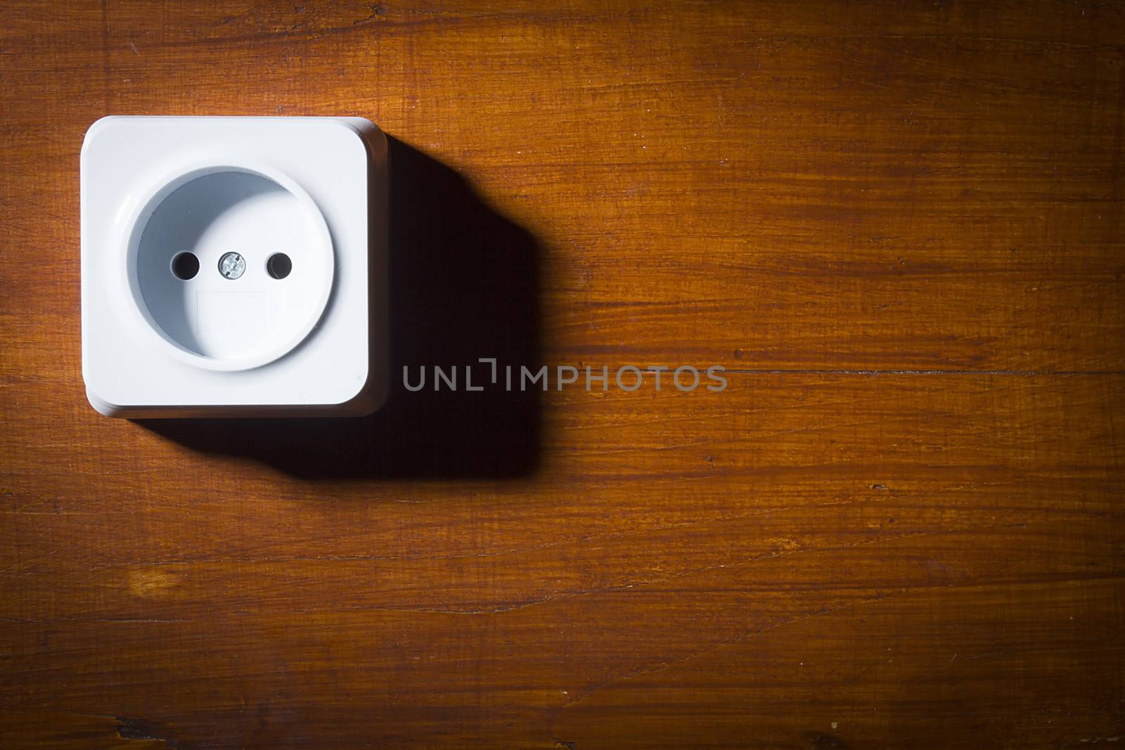 Electrical outlet on wooden wall by VIPDesignUSA