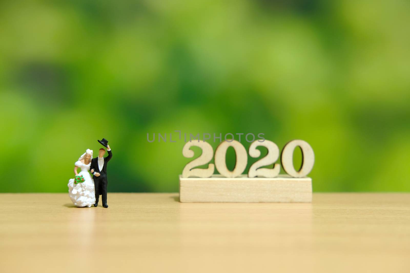Miniature figure people, bride and groom with 2020 wooden number by Macrostud