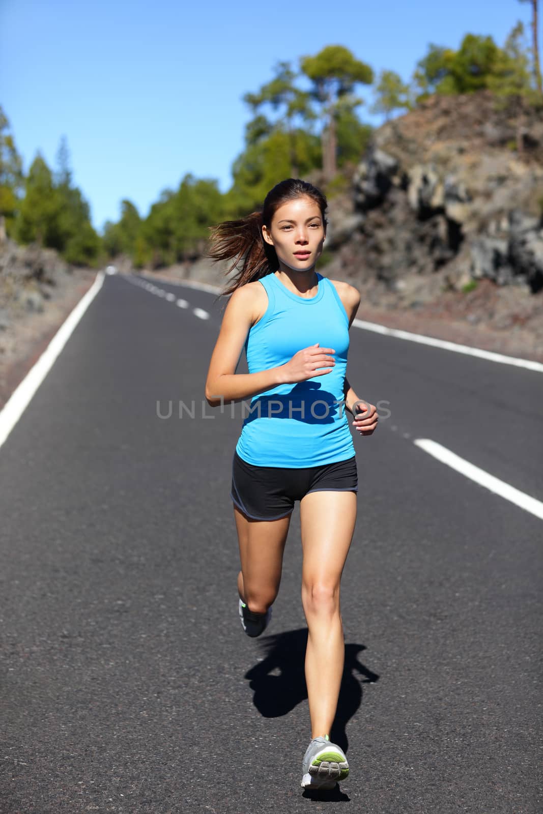 Running woman - female runner jogging by Maridav