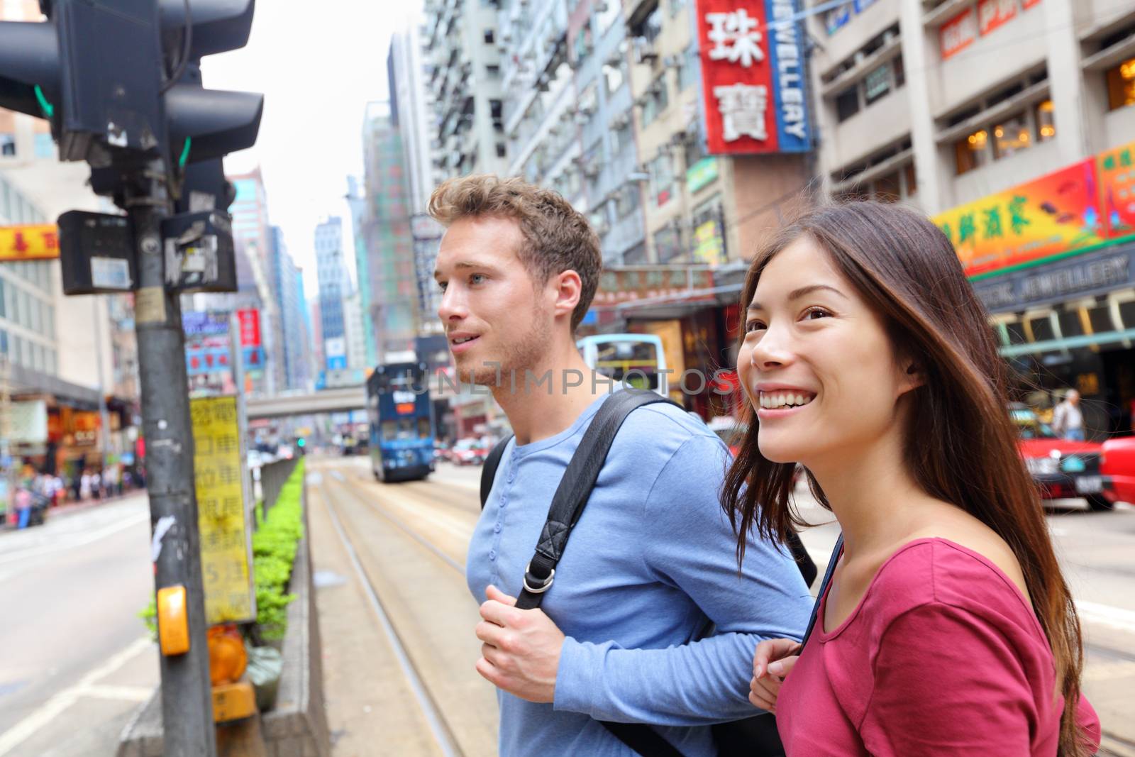 Hong Kong Causeway Bay people walking by Maridav